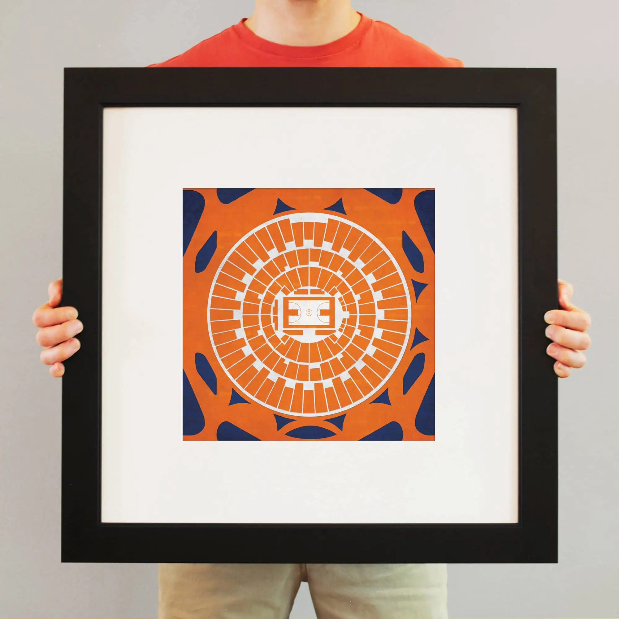 Intricate artwork featuring a stylized basketball arena design, vibrant orange and navy blue colors, framed for display, perfect for sports enthusiasts and collectors.