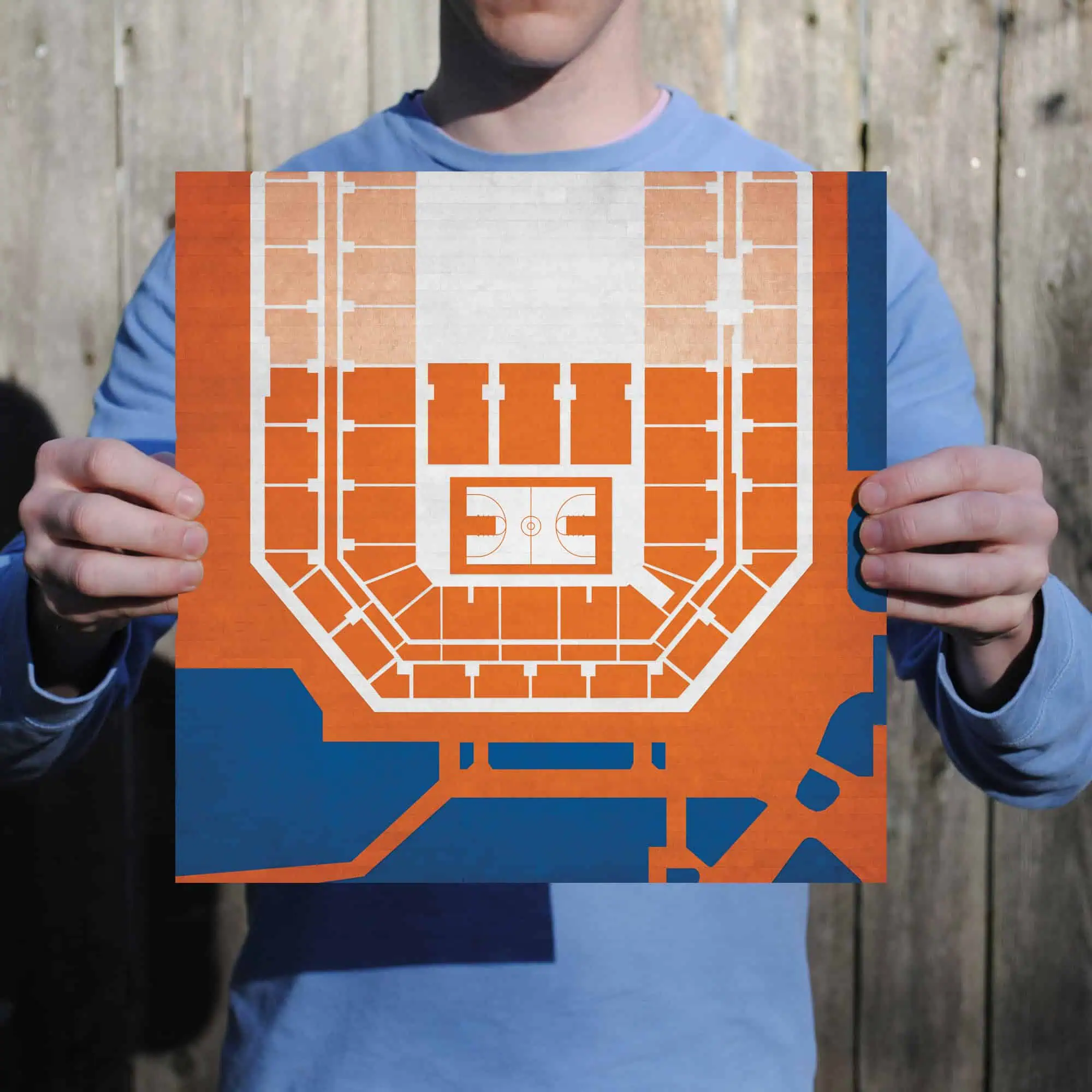 Map of basketball arena seating layout, showing court positioning, spectator sections, and entrance pathways for event planning and venue navigation.