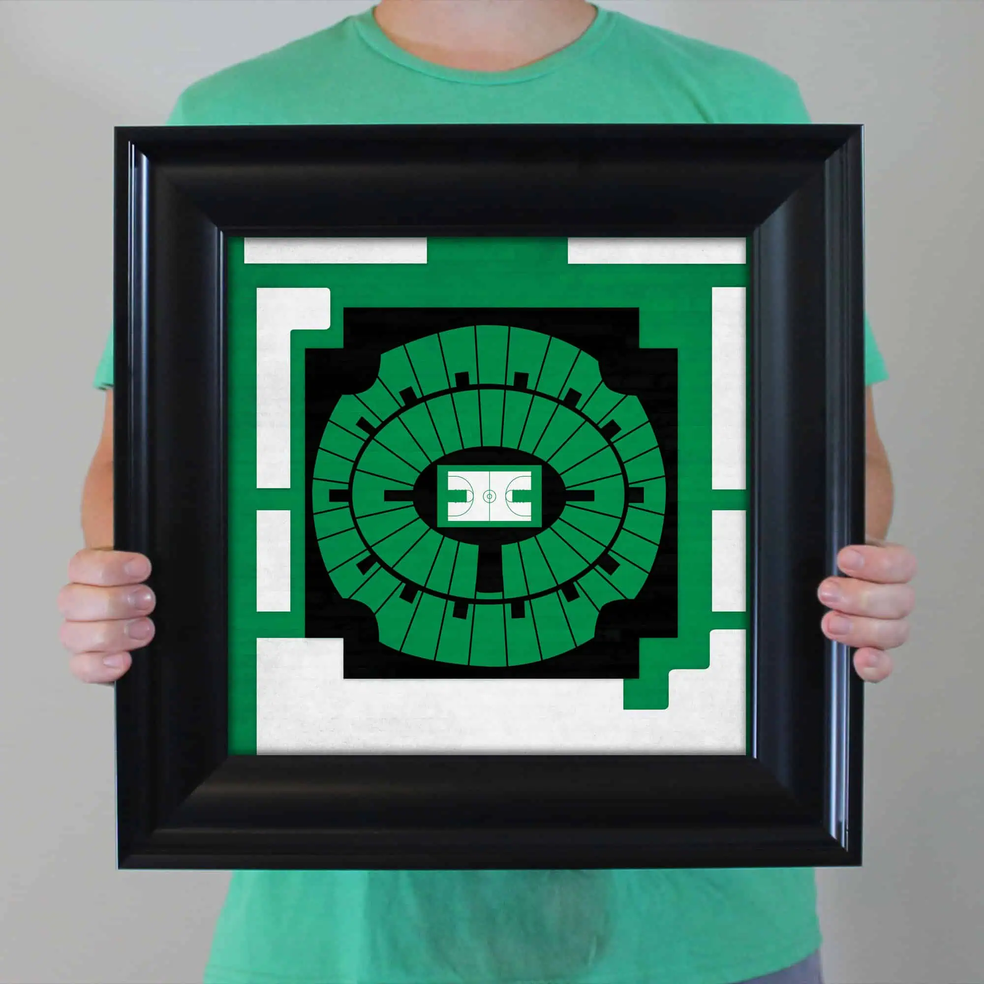 FIFA World Cup stadium map artwork held in person by person in green shirt, showcasing a detailed seating chart for soccer fans and stadium explorers, ideal for sports venue maps and fan memorabilia.