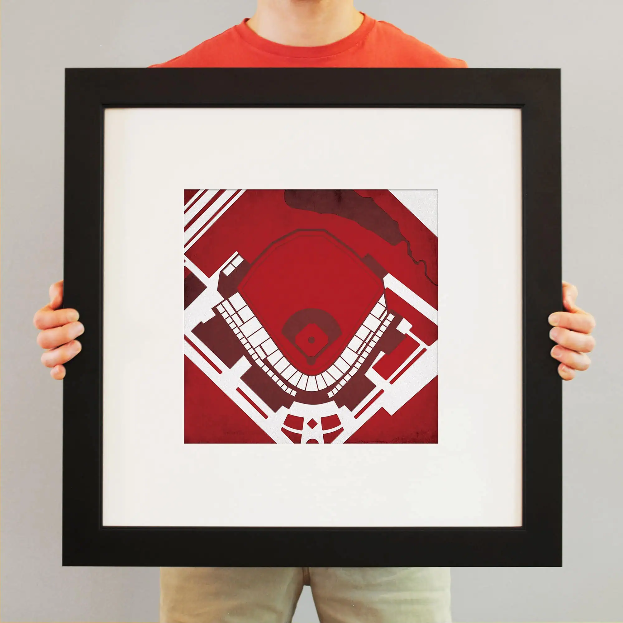 Detailed aerial view of a baseball stadium in red and white, with surrounding field and infrastructure, showcasing sports venue maps and stadium layouts for fans and event planning.