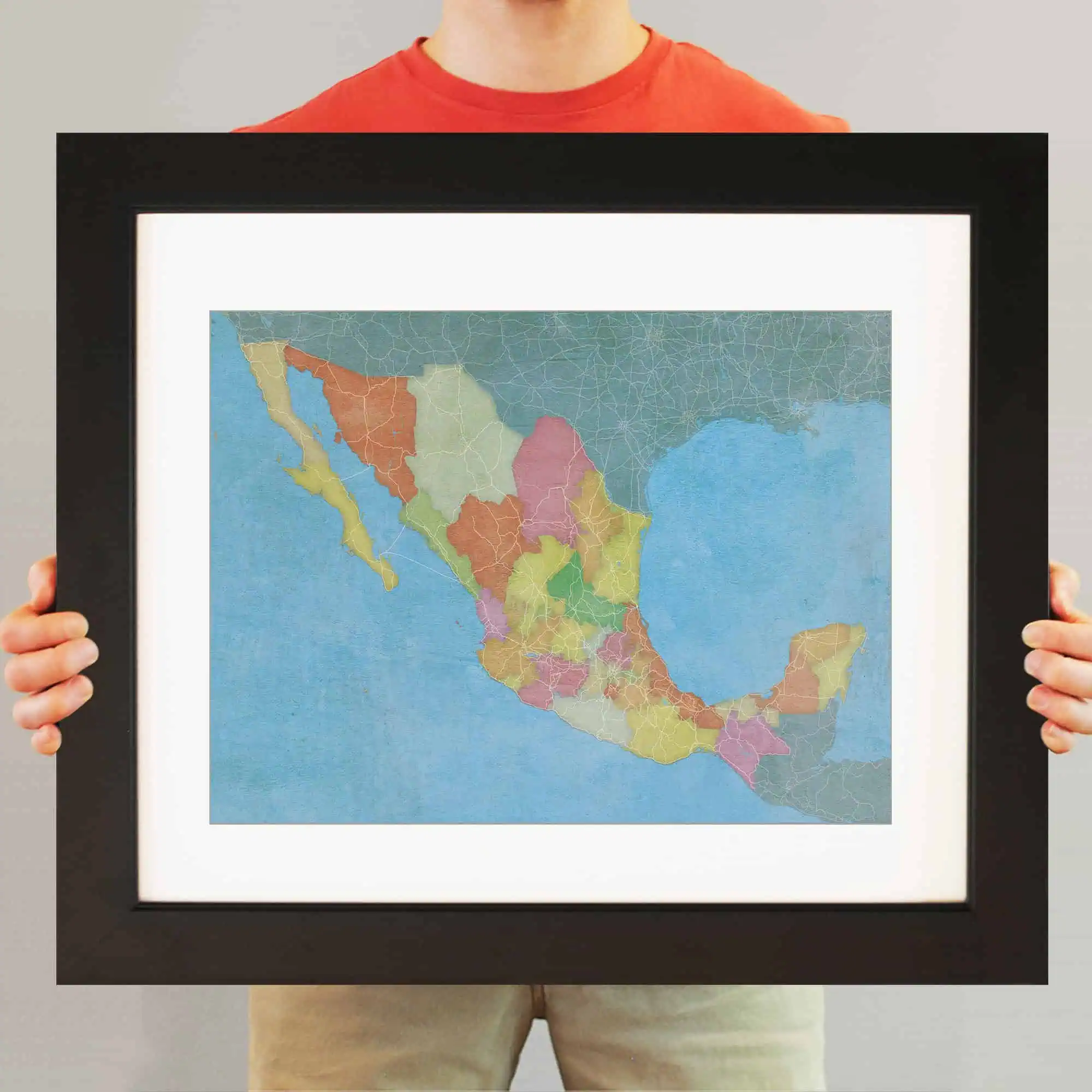Colorful political map of Mexico showcasing its states and geographical features, ideal for educational purposes and navigation, from The Map Shop.