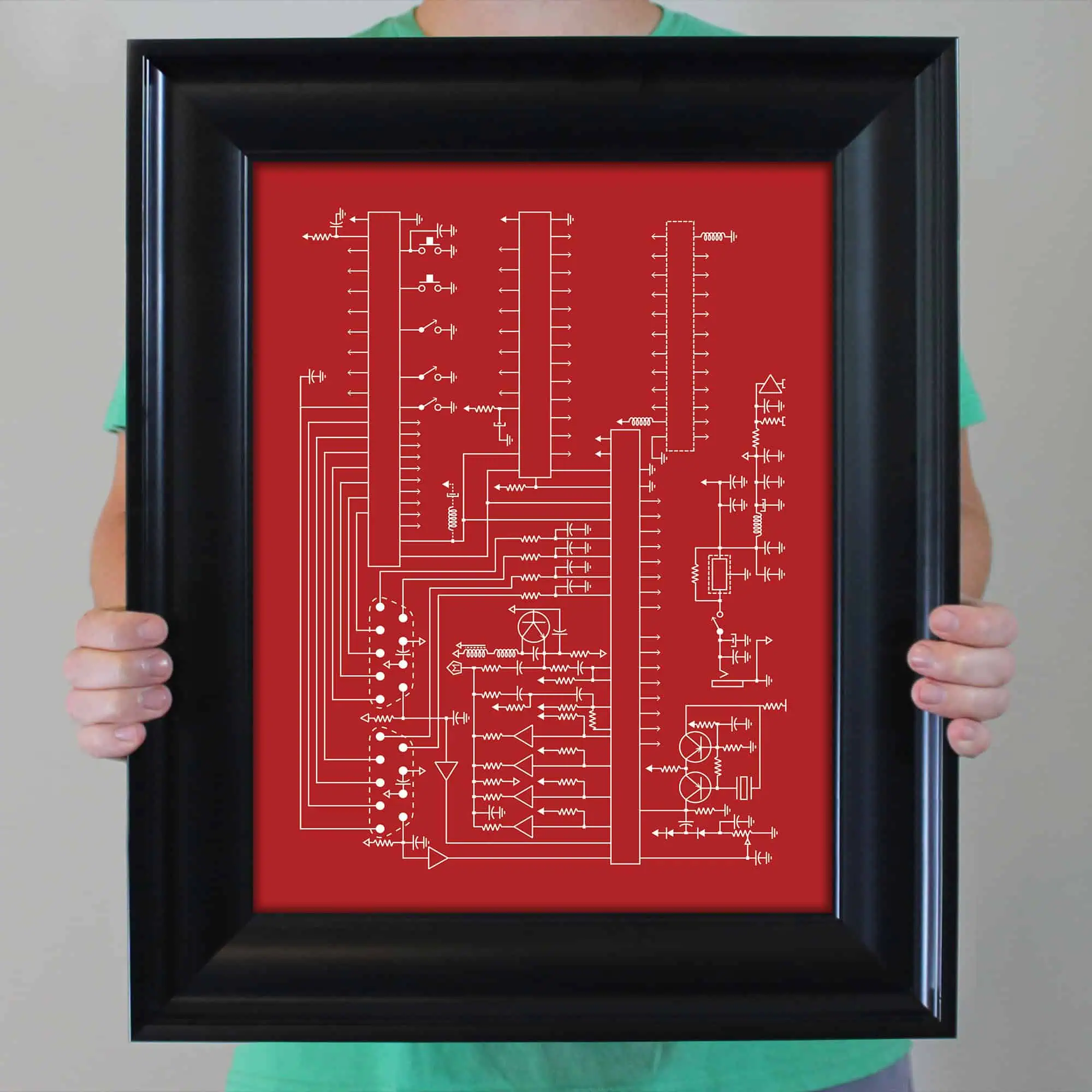 A framed schematic electronic circuit diagram with a red background, ideal for engineers and electronics enthusiasts.