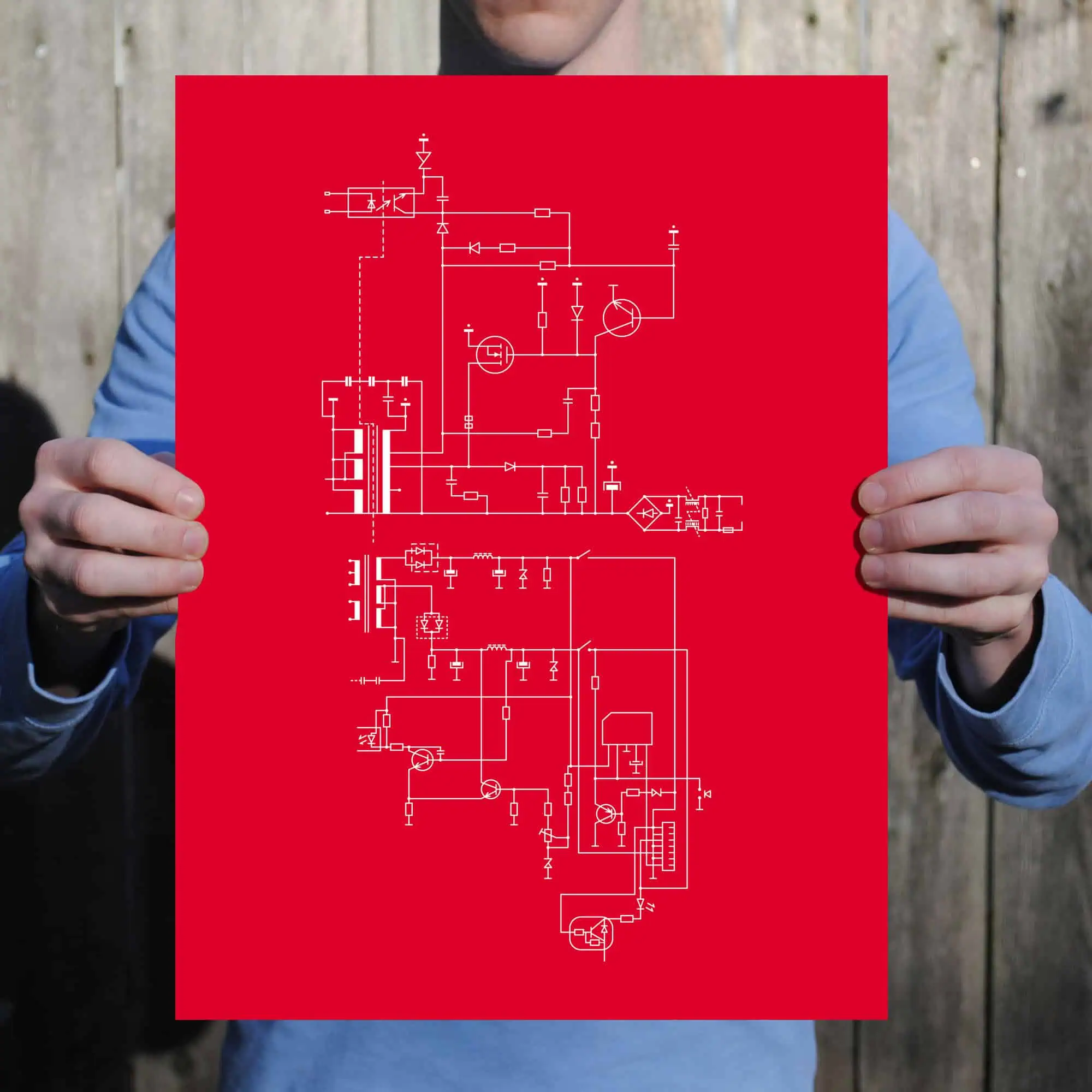 Electrical schematic diagram on red background, showcasing electronic circuit design and engineering blueprint.