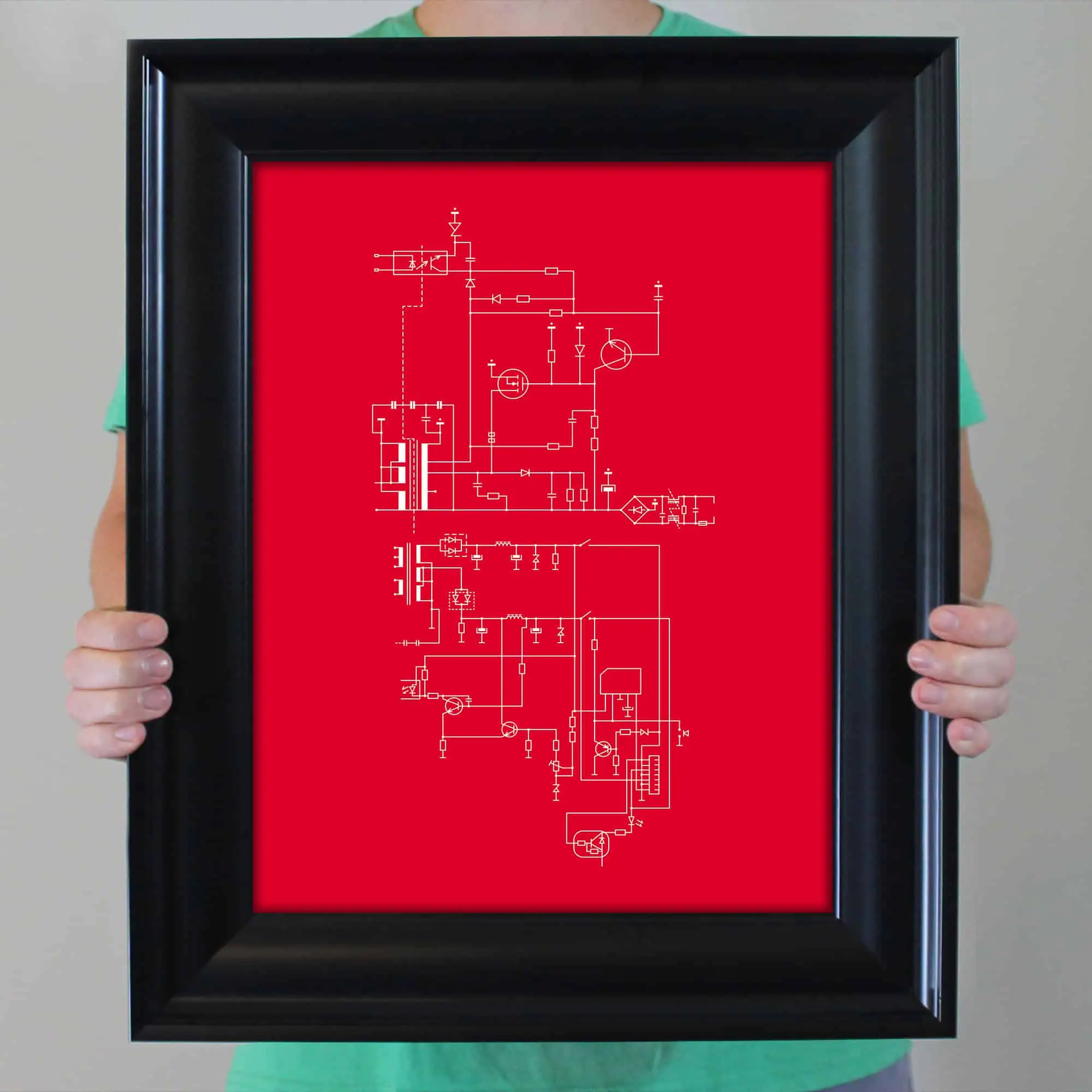 Blueprint technical drawing displayed on a red background, held in a black picture frame person with a teal shirt. Perfect for engineering, design, and map enthusiasts.
