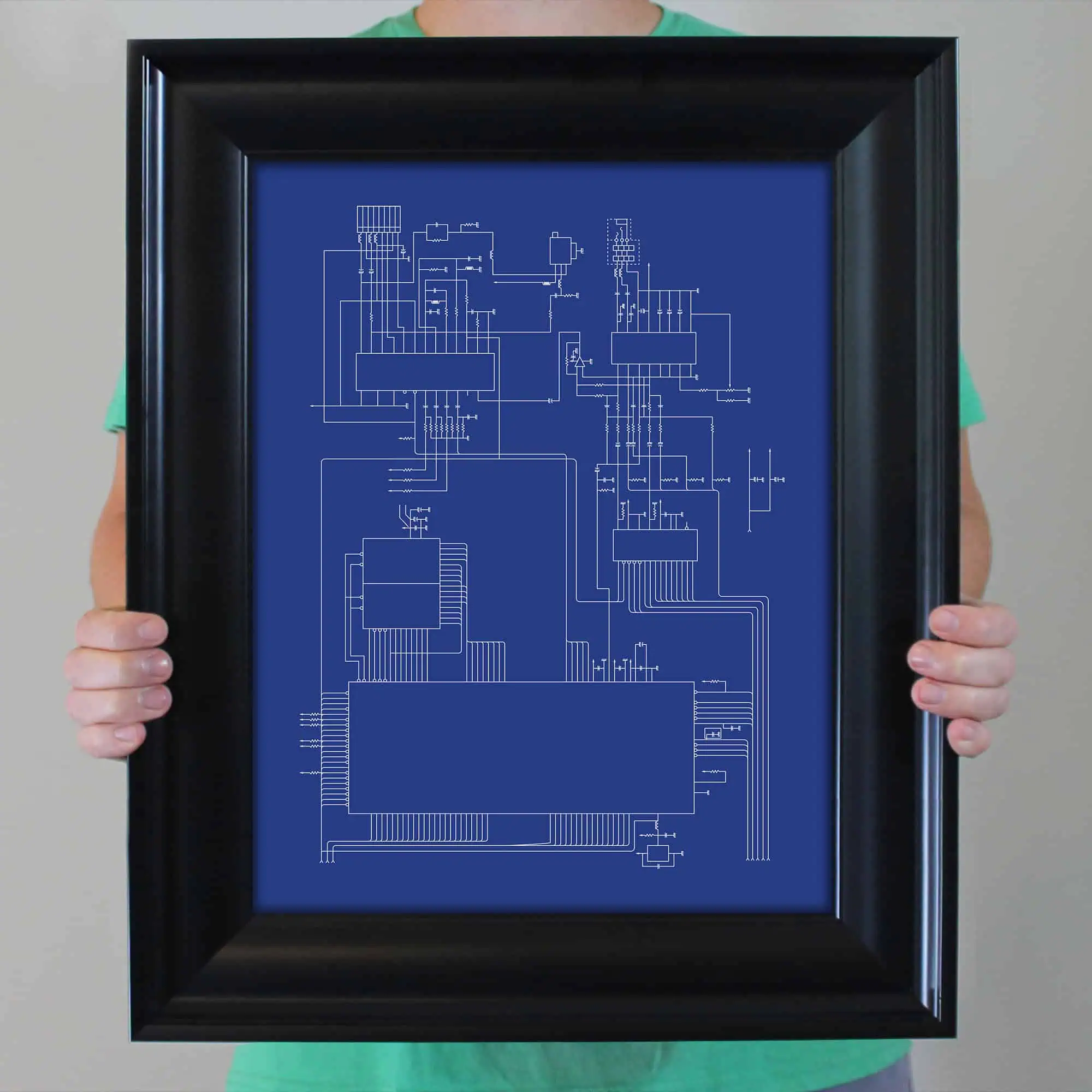 Blueprint diagram of electronic circuit mounted on a blue background.