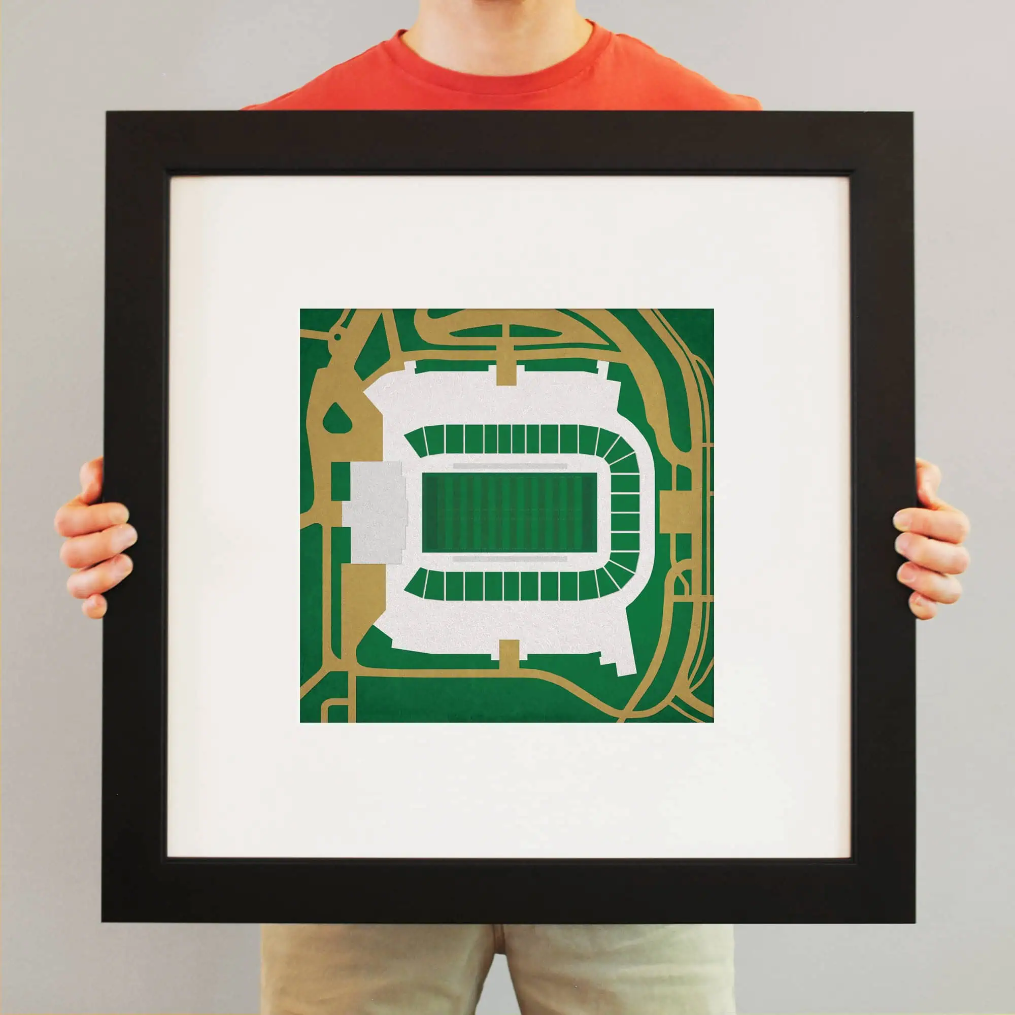 Aerial view of a sports stadium illustration framed in black, showcasing detailed map artwork and stadium layout for sports fans and map collectors.