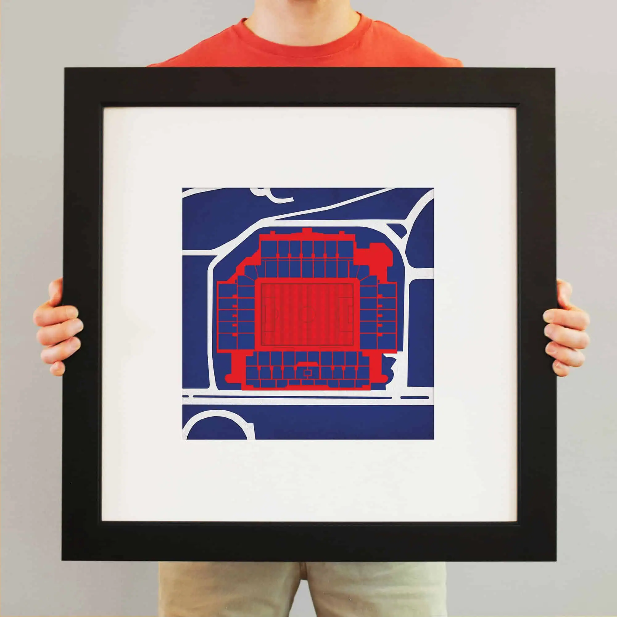 A framed map of a sports stadium highlighting its seating arrangement and overall layout, perfect for sports fans, event planners, or stadium enthusiasts.
