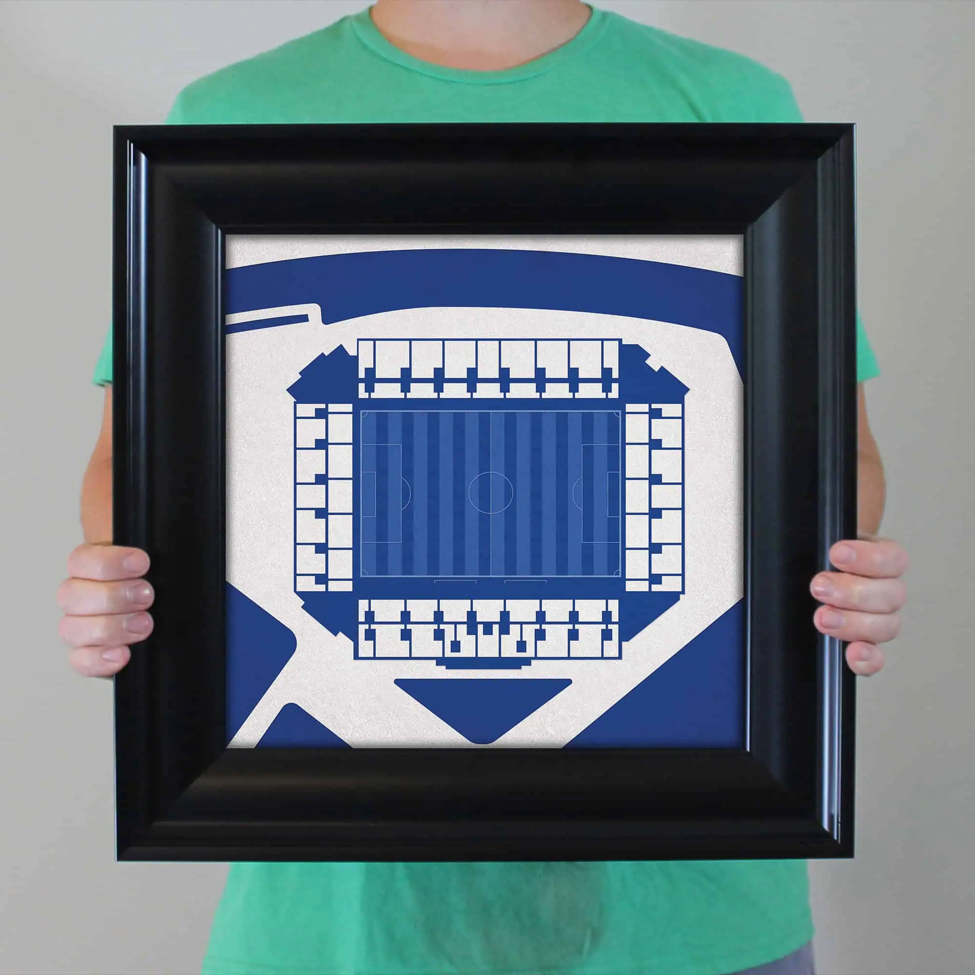 Blue soccer stadium blueprint framed artwork showcasing detailed stadium seating and field layout for sports enthusiasts and designers.