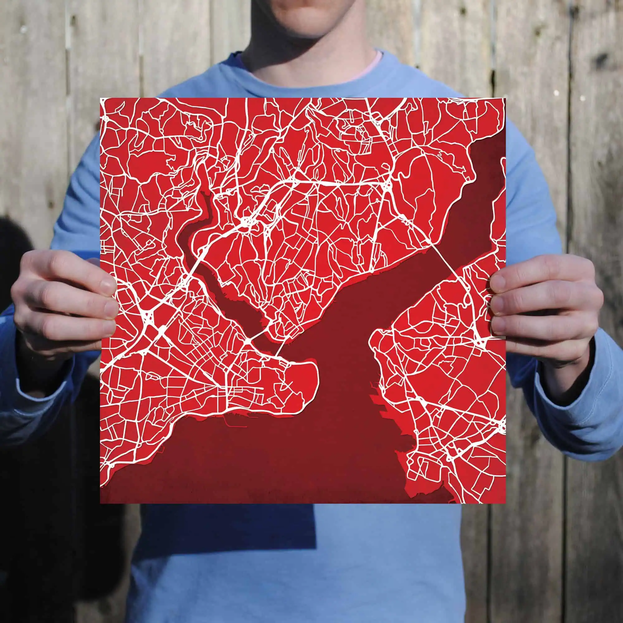 Map of a city with water features, street details, and urban layout for navigation and geographic reference.