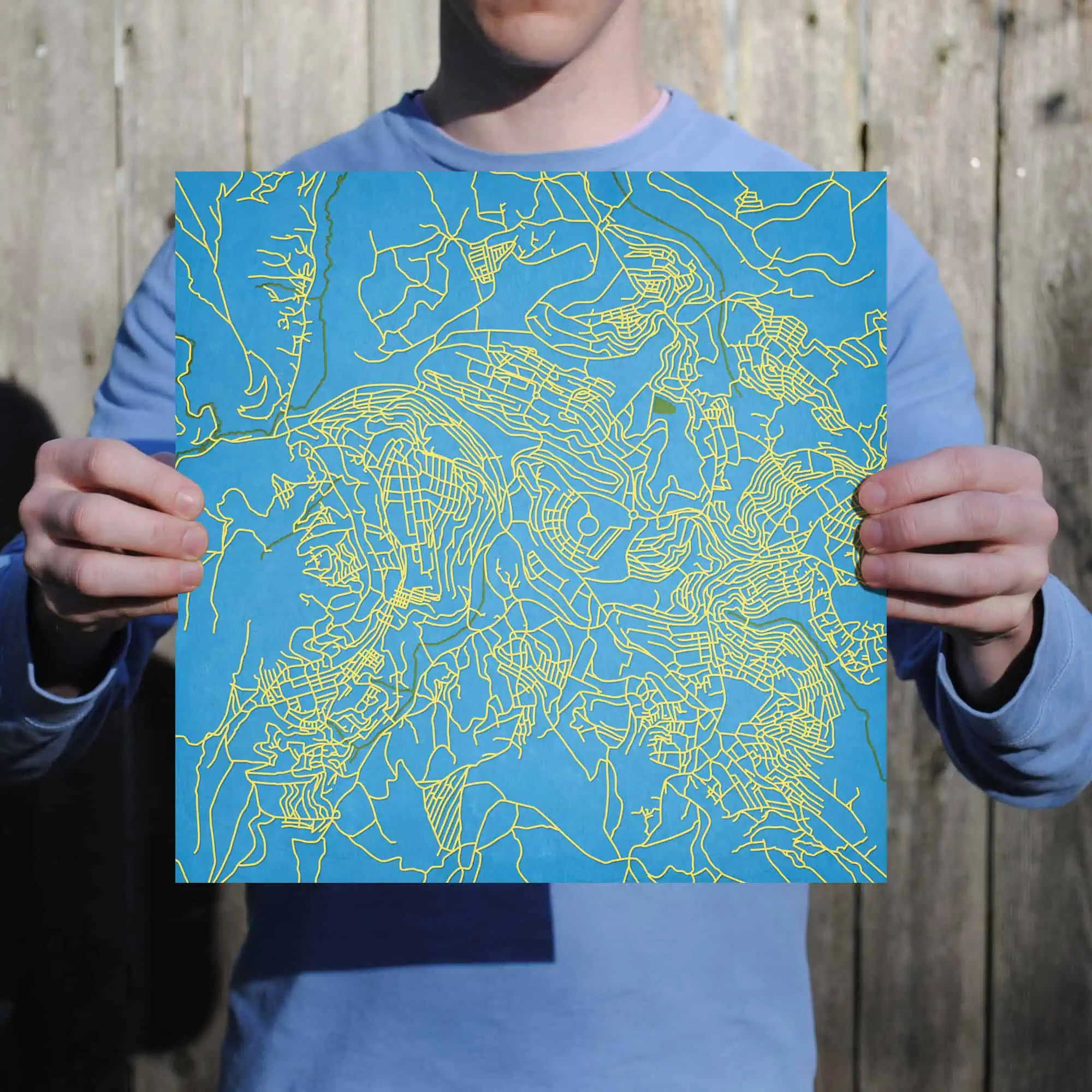 Detailed map of mountain trails and hiking routes in a vibrant blue and yellow color scheme, perfect for outdoor enthusiasts and navigation planning.