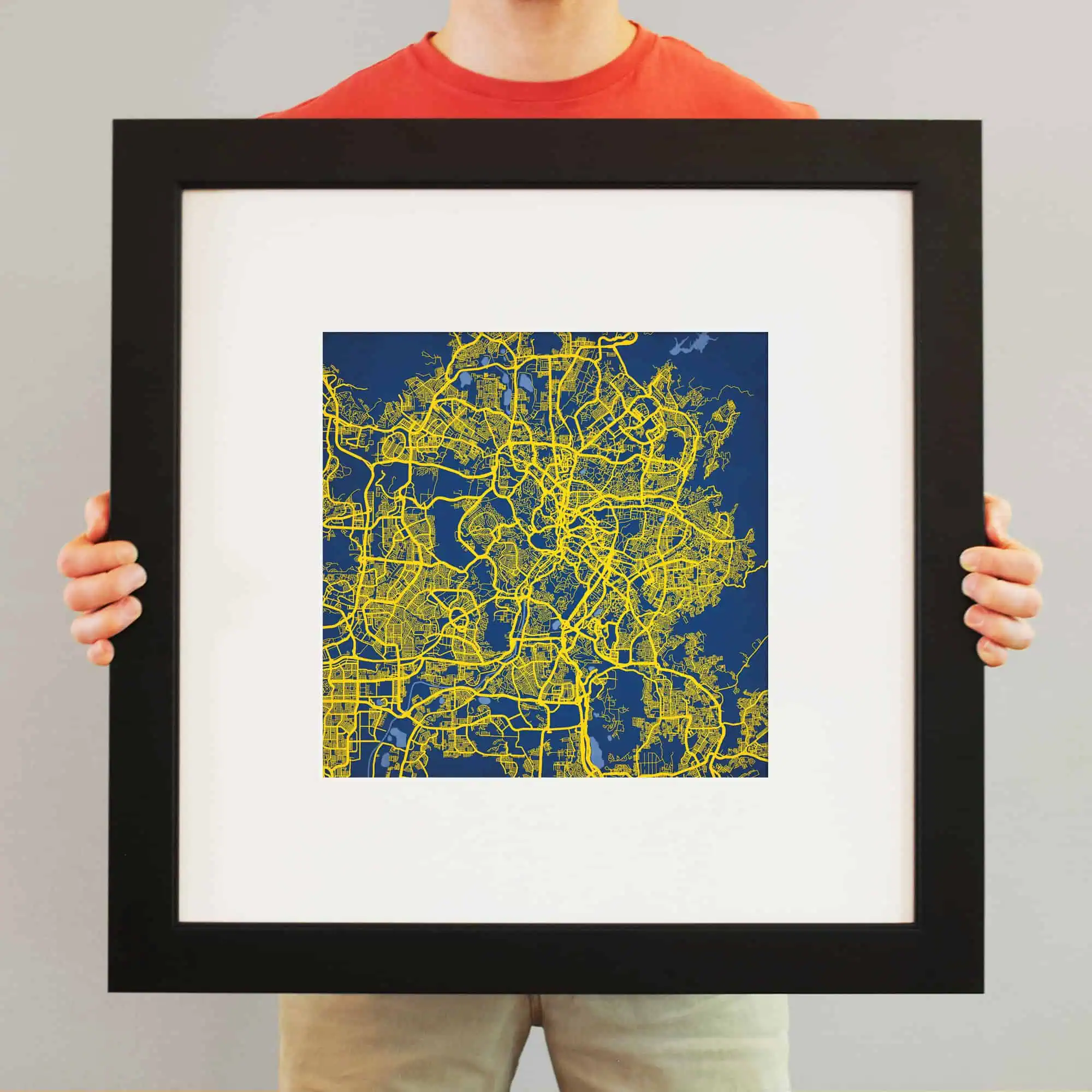 Urban city map artwork with yellow streets on a dark blue background, perfect for travel and navigation enthusiasts.