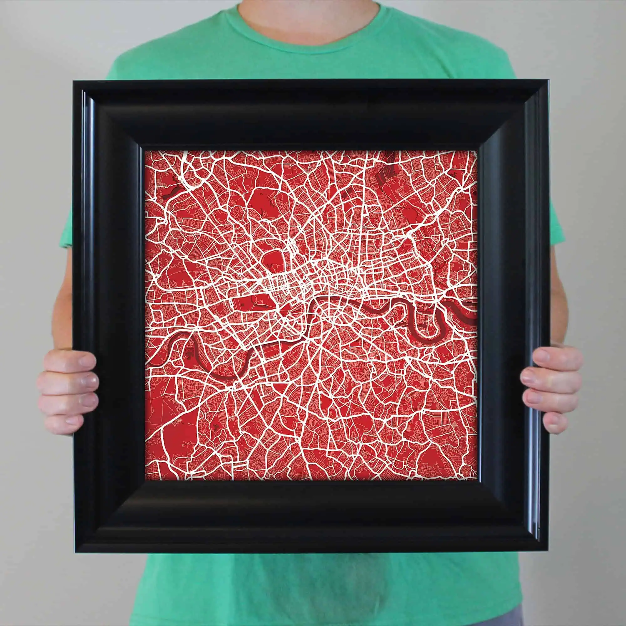 Vibrant city map artwork featuring detailed street layouts in red and white, framed for wall decor, ideal for map enthusiasts and urban explorers.