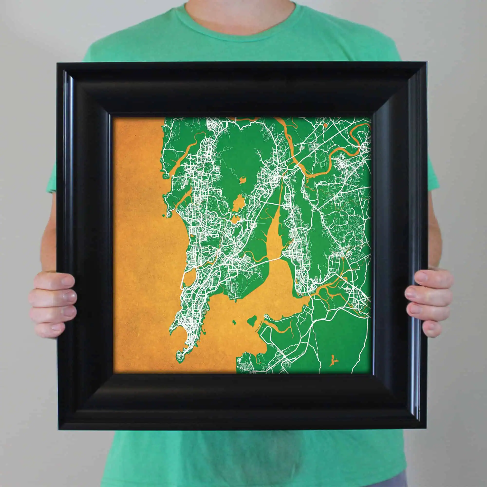 Detailed map of city streets and waterways in a framed art piece, perfect for travel enthusiasts and map collectors.