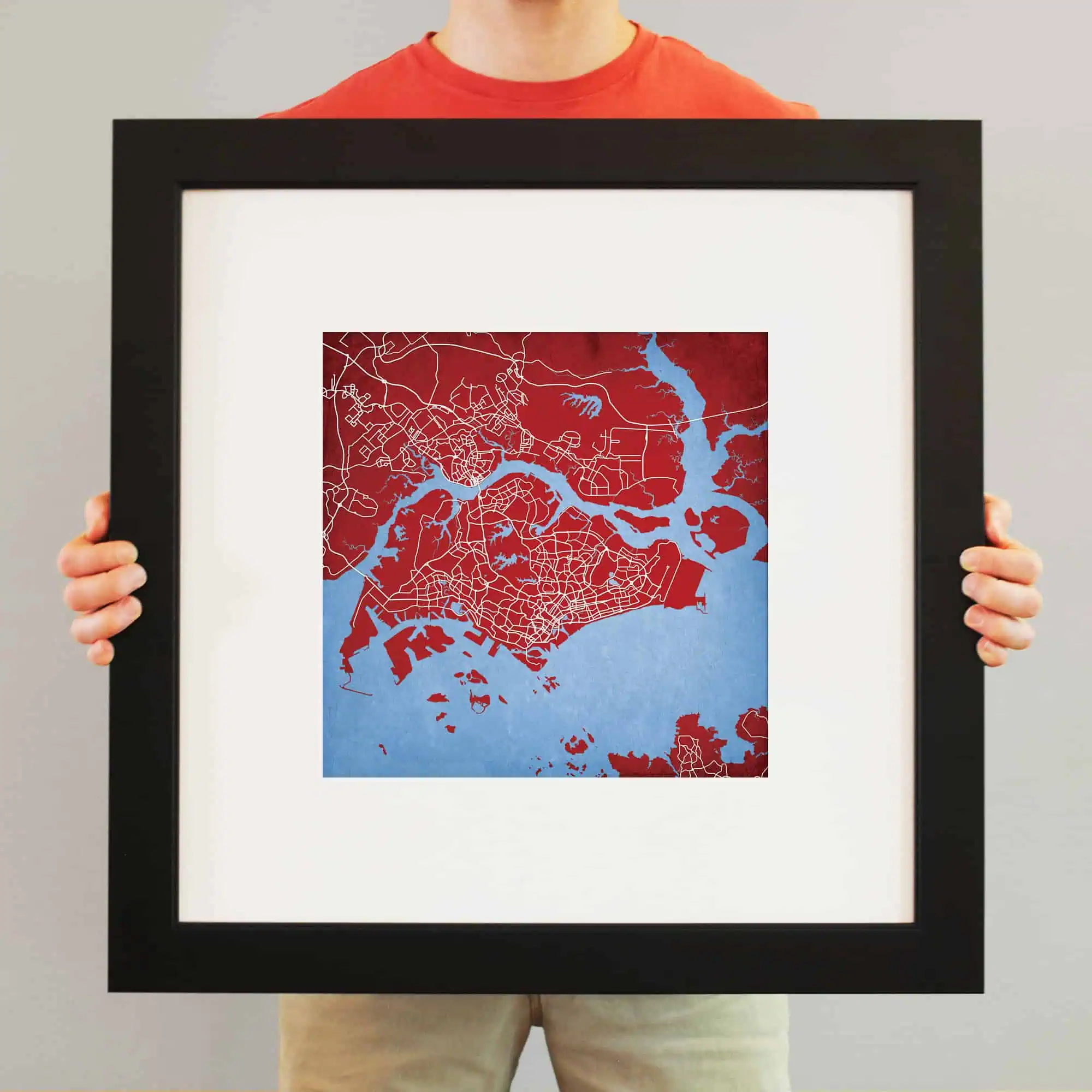 Detailed map illustration of a coastal city with waterways and streets, artfully displayed in a modern black frame, perfect for travel and navigation enthusiasts.