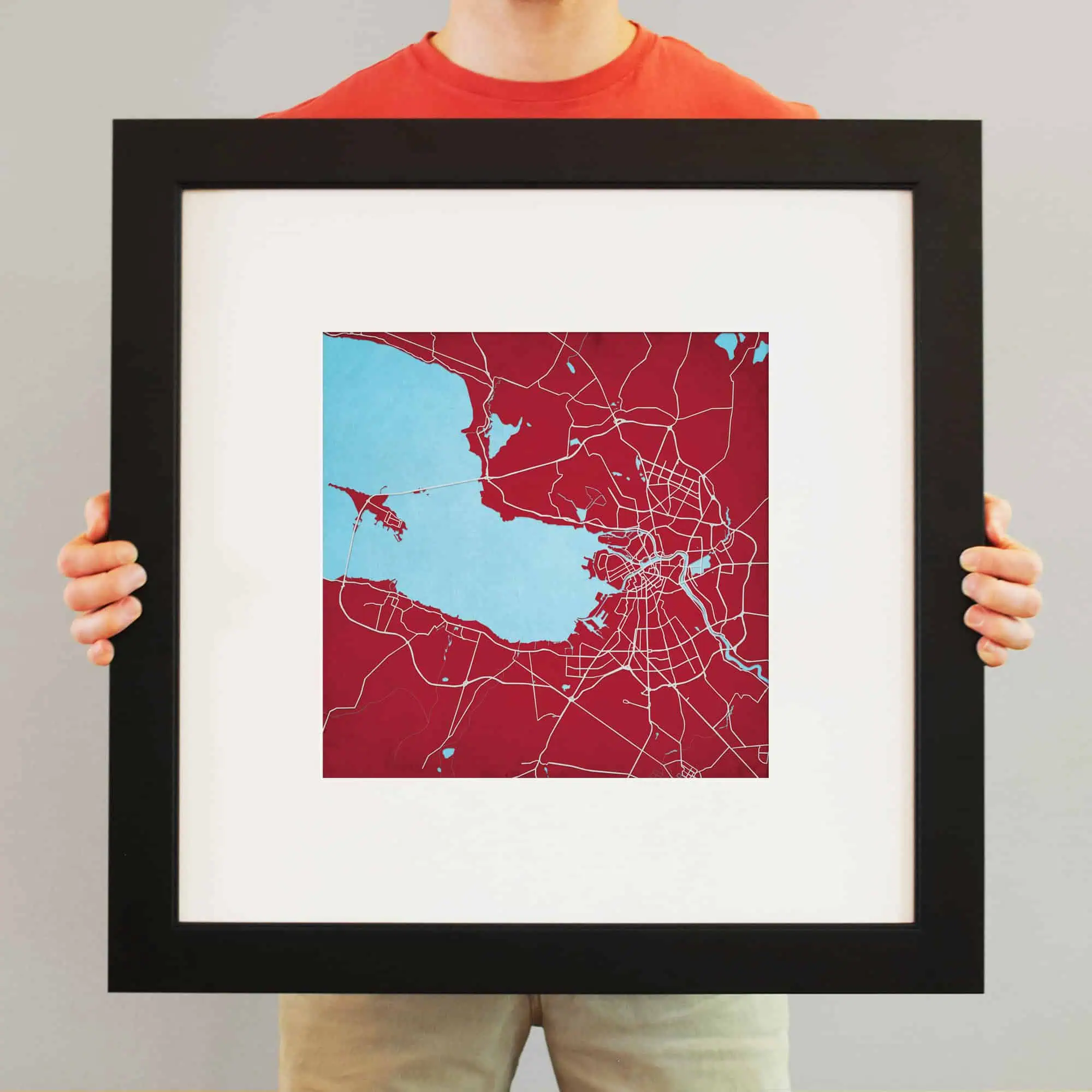 Detailed map of a lakeside city with streets and waterways, emphasizing geographic features and urban layout.