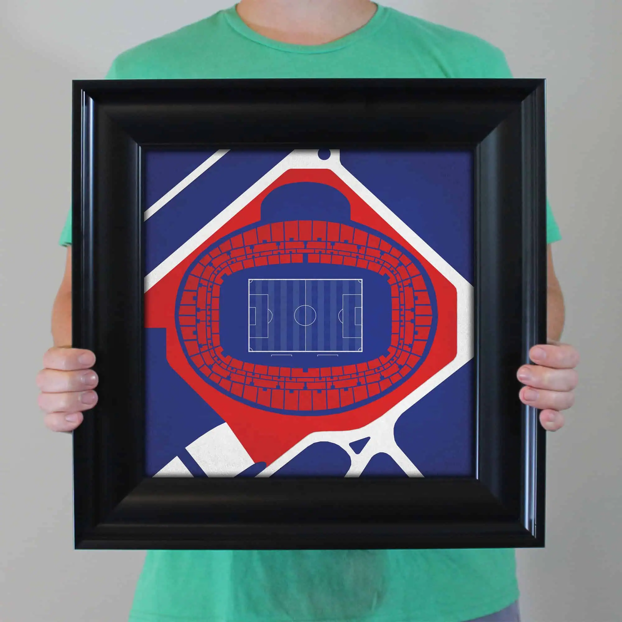 A framed aerial view of a soccer stadium with a detailed map design, emphasizing sports maps, stadium layouts, and geographic mapping for sports enthusiasts.