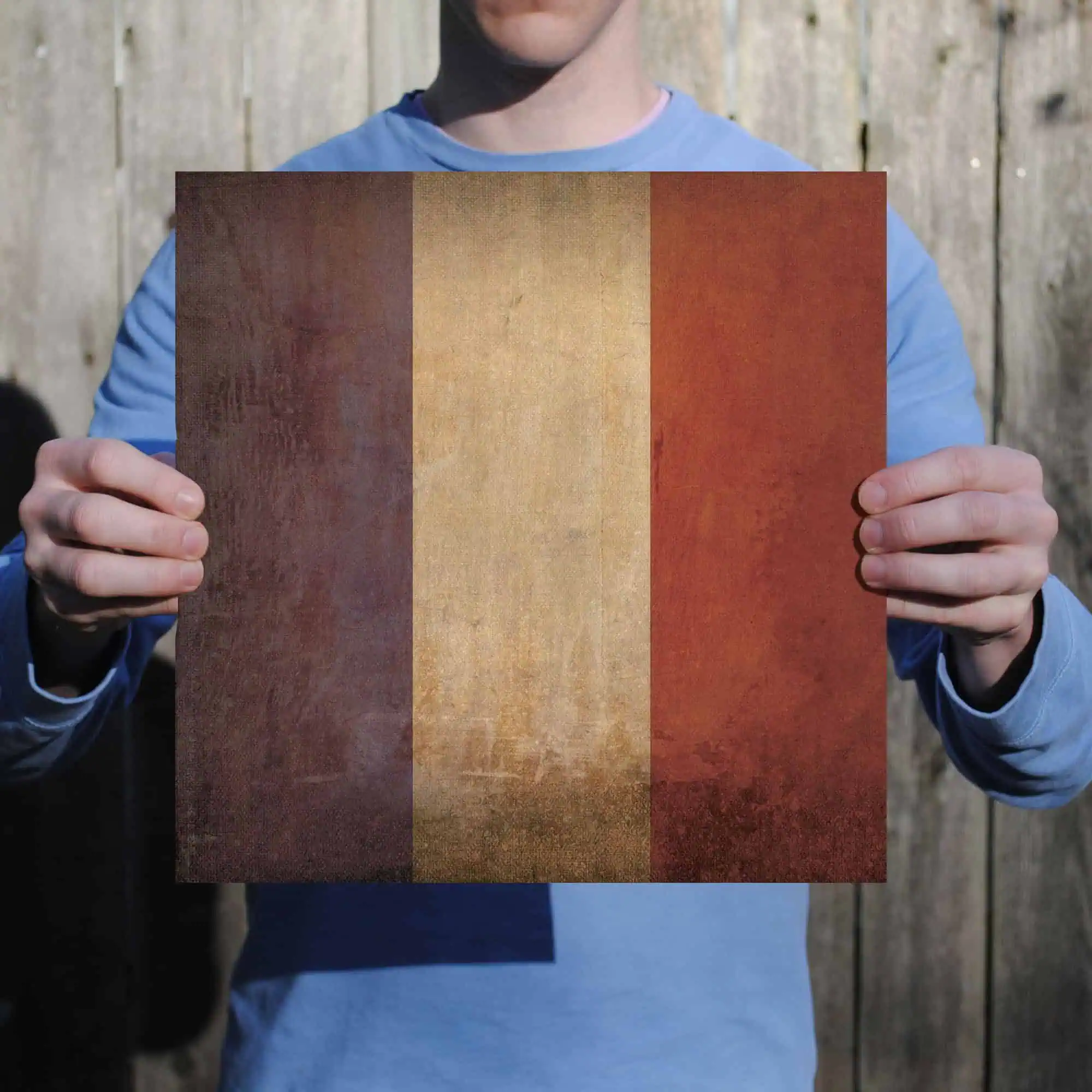 Colorful vintage wood plank decor with rustic texture and warm tones.