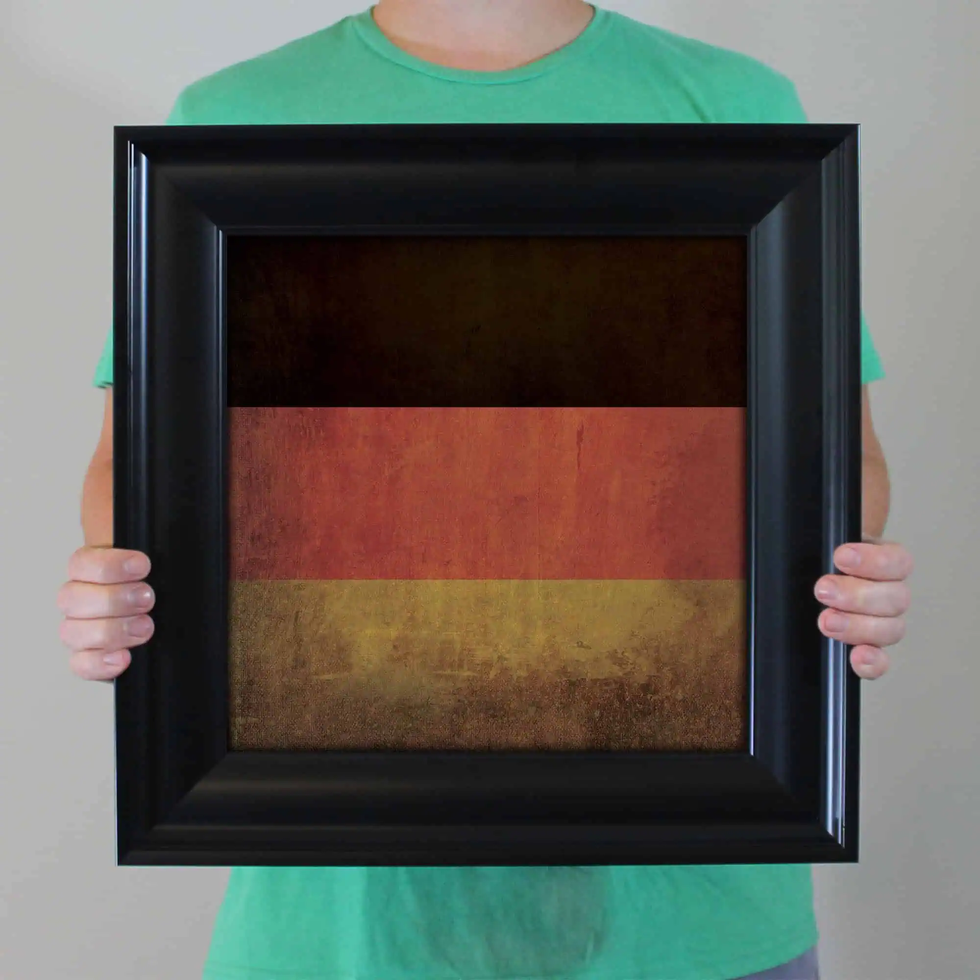 Berlin Germany flag artwork displayed in a black frame, showcasing the colors black, red, and gold with a textured, vintage look. Perfect for travel, maps, and geographic decor enthusiasts.