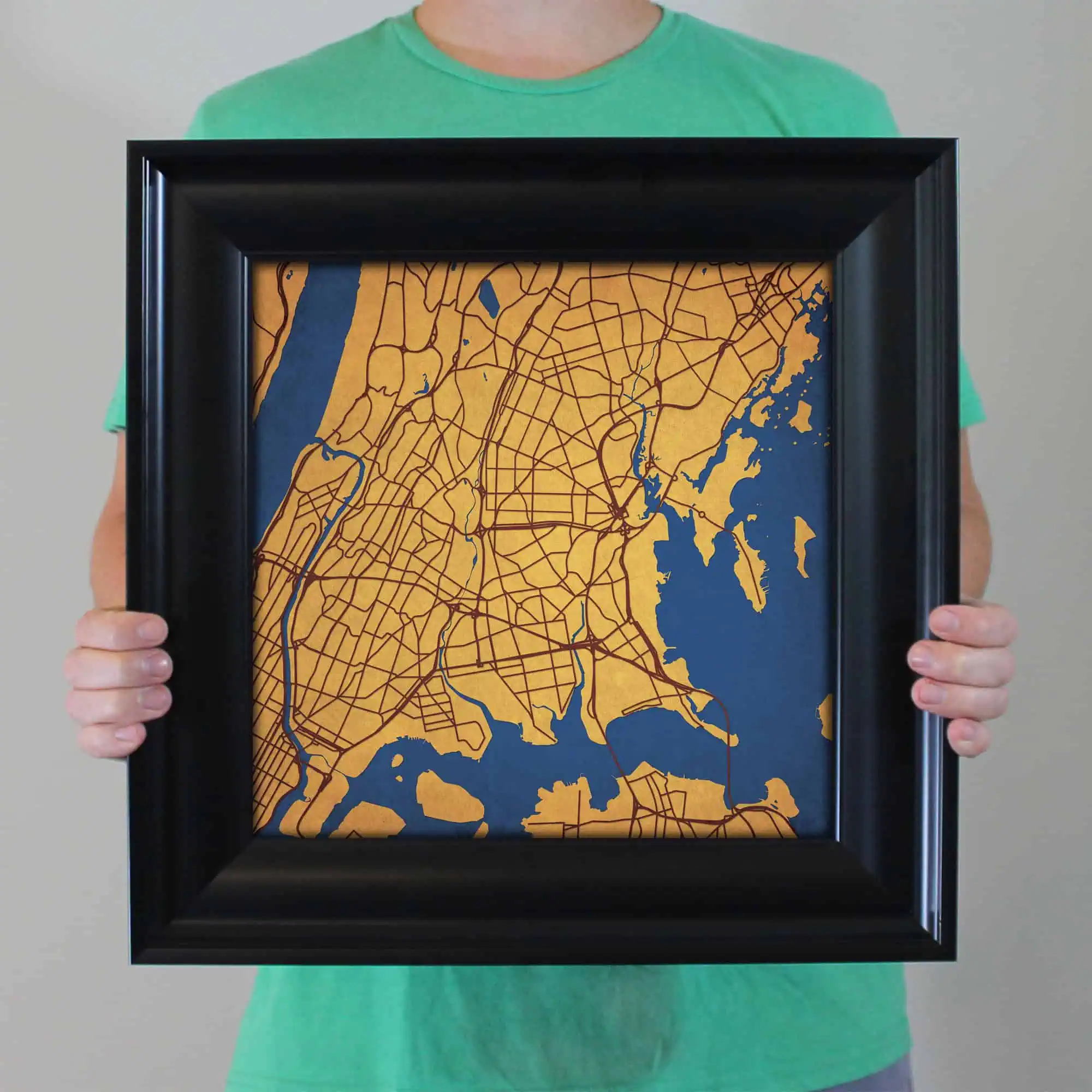 Detailed map of New York City with streets, waterways, and landmarks, framed as a decorative urban cartography art piece. Perfect for travel enthusiasts and map collectors.