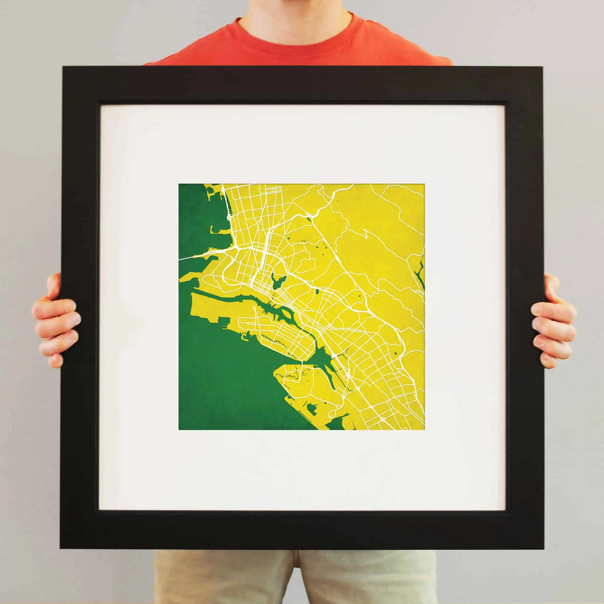 Detailed map of a city featuring parks and waterways, framed and displayed; perfect for travel planning or decorative purposes.