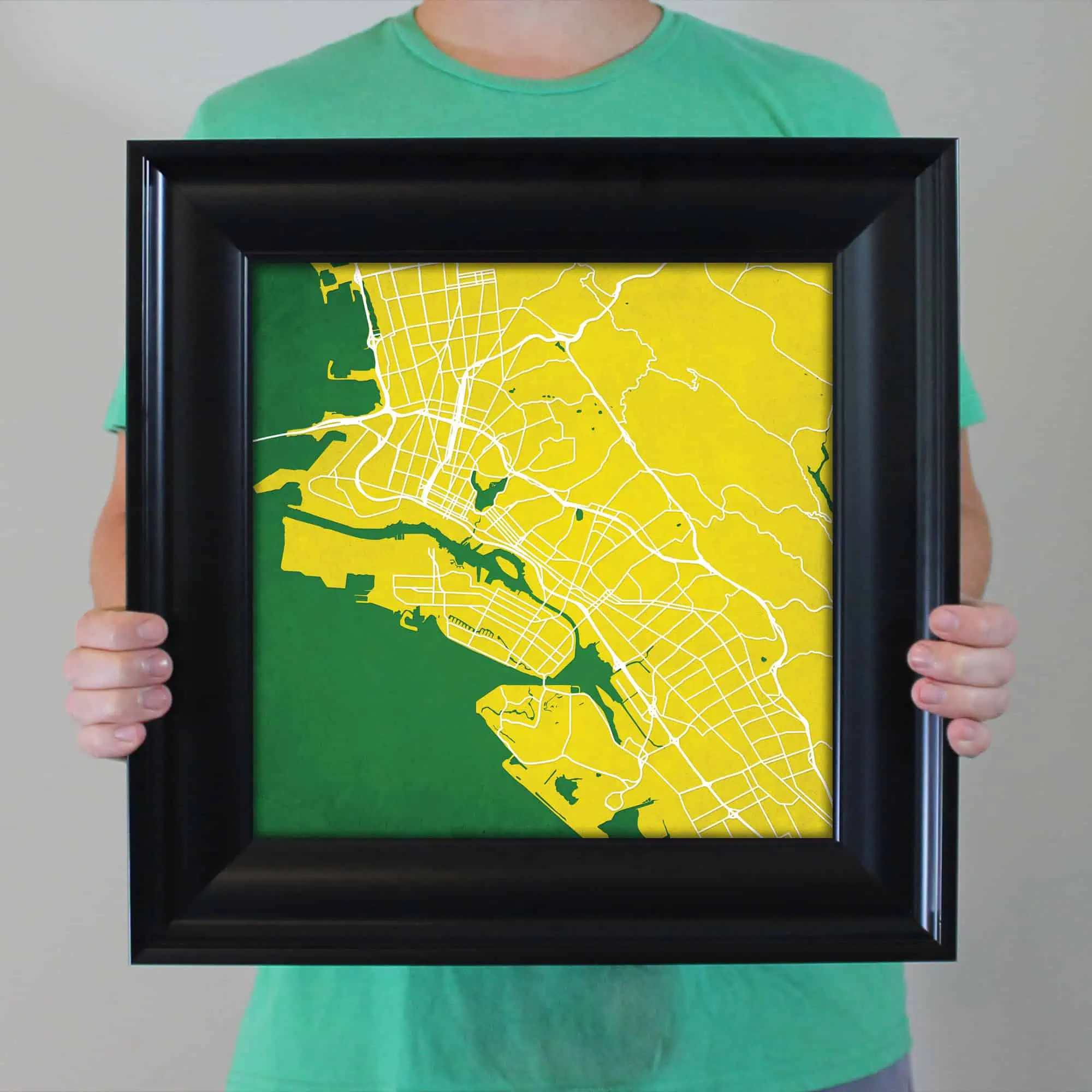 A detailed map of a city with streets, waterways, and land areas, featuring a yellow and green color scheme; perfect for navigation, travel planning, and geographic reference.