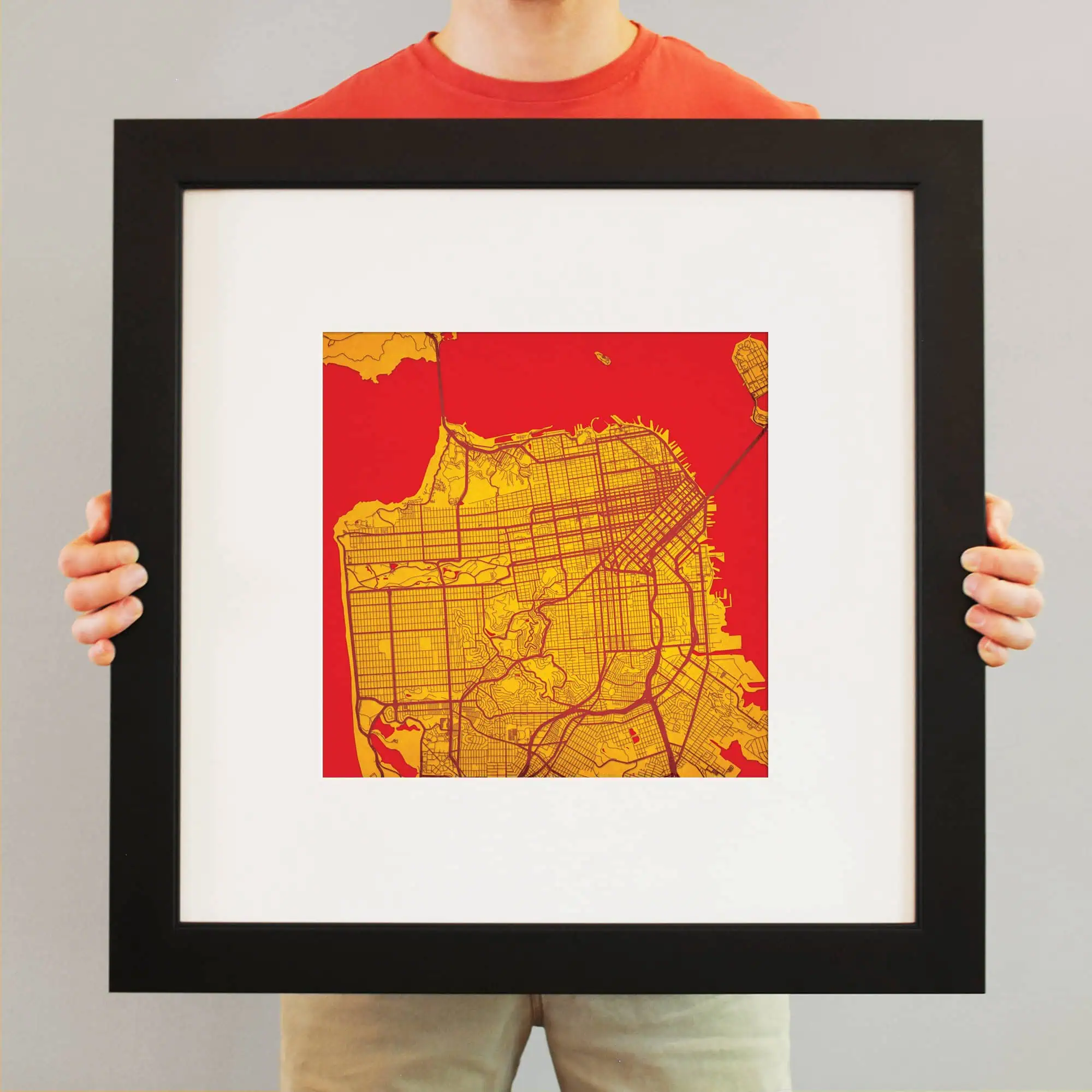 Detailed map artwork of Seattle, Washington, featuring street layouts and city landmarks in vibrant red and yellow colors, perfect for travel and navigation enthusiasts.