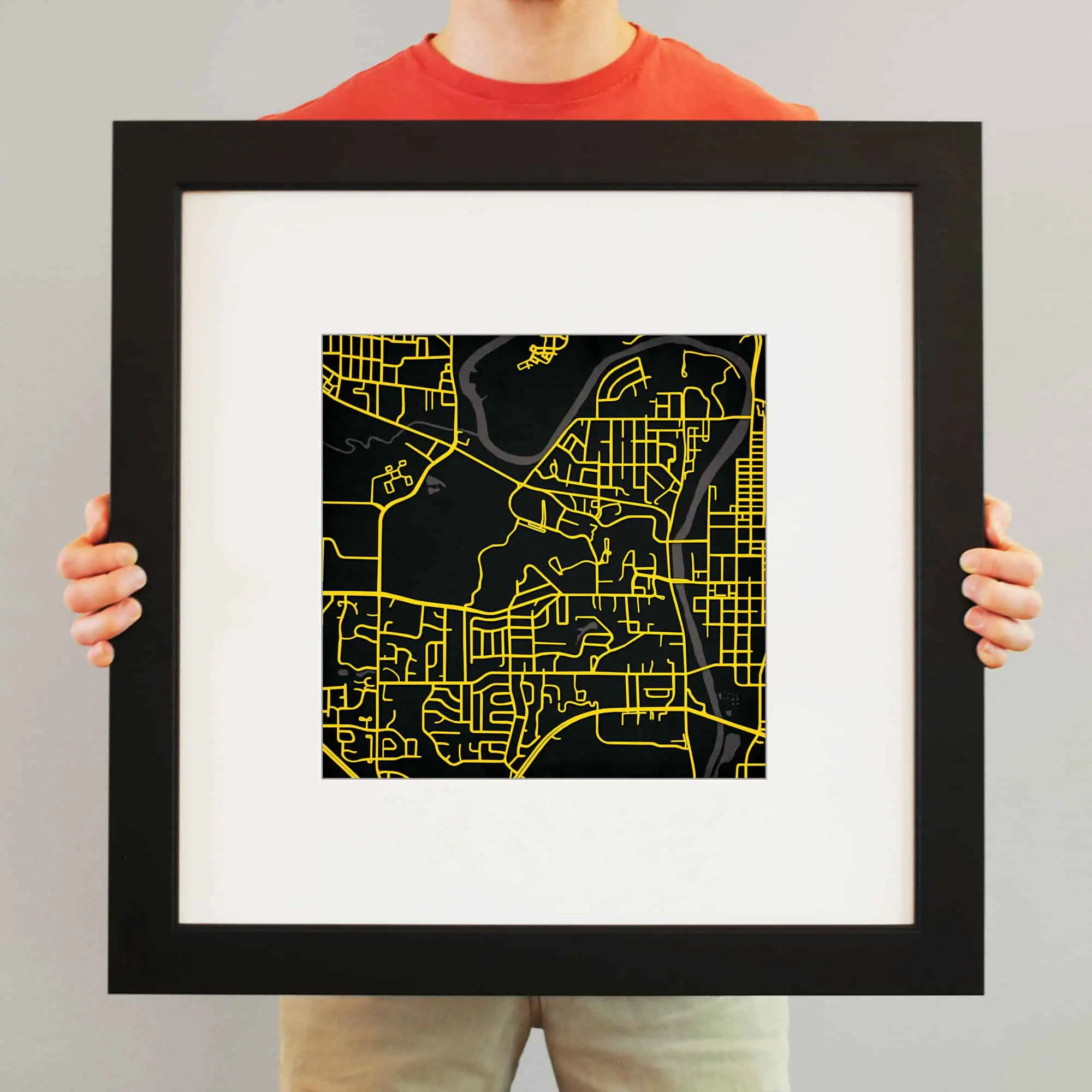 A modern map art print featuring a city street map with yellow lines on a black background, suitable for decorative and travel-themed interior decor.