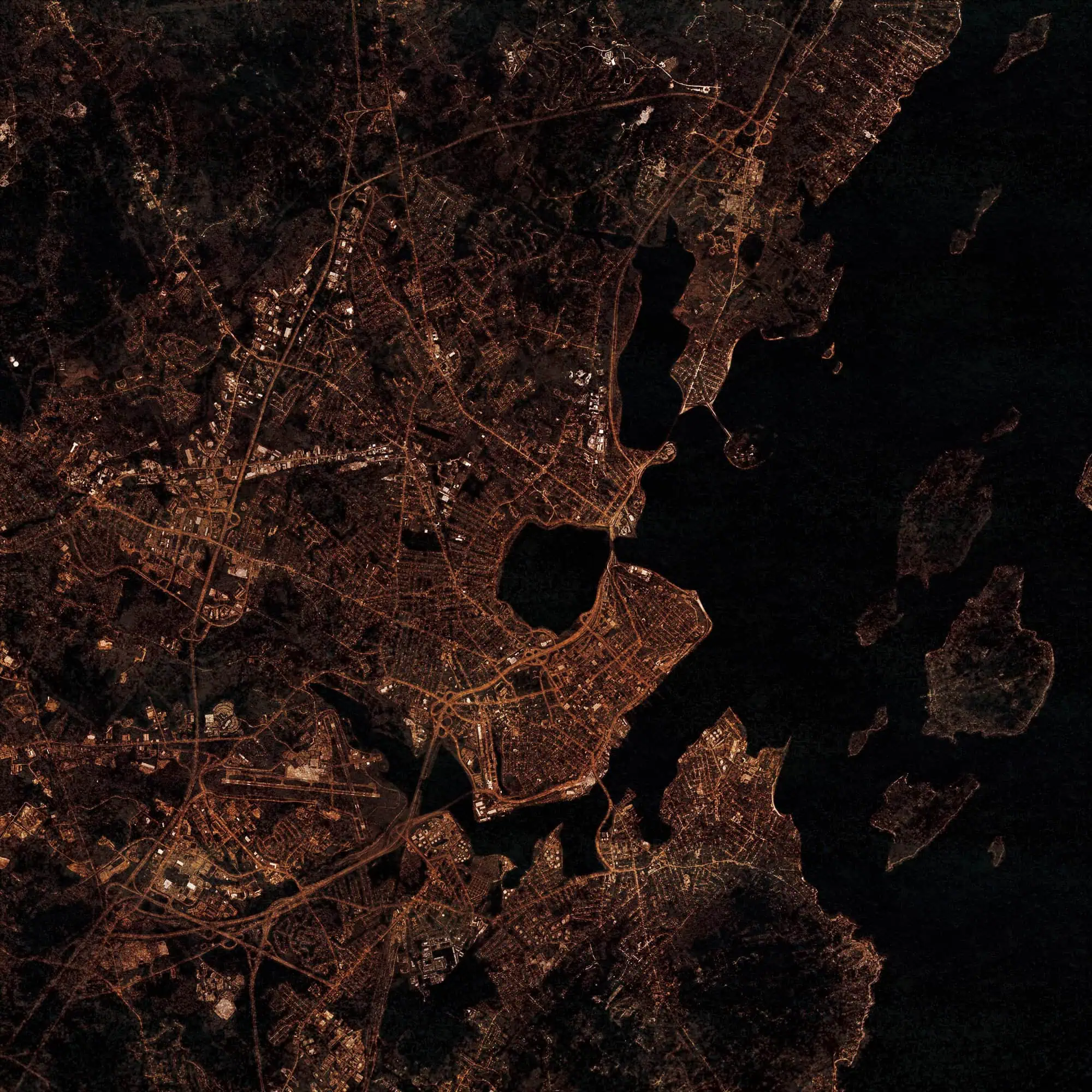 Aerial view of a city illuminated at night, showcasing detailed streets, waterways, and urban layout with a dark background, ideal for maps and navigation services.