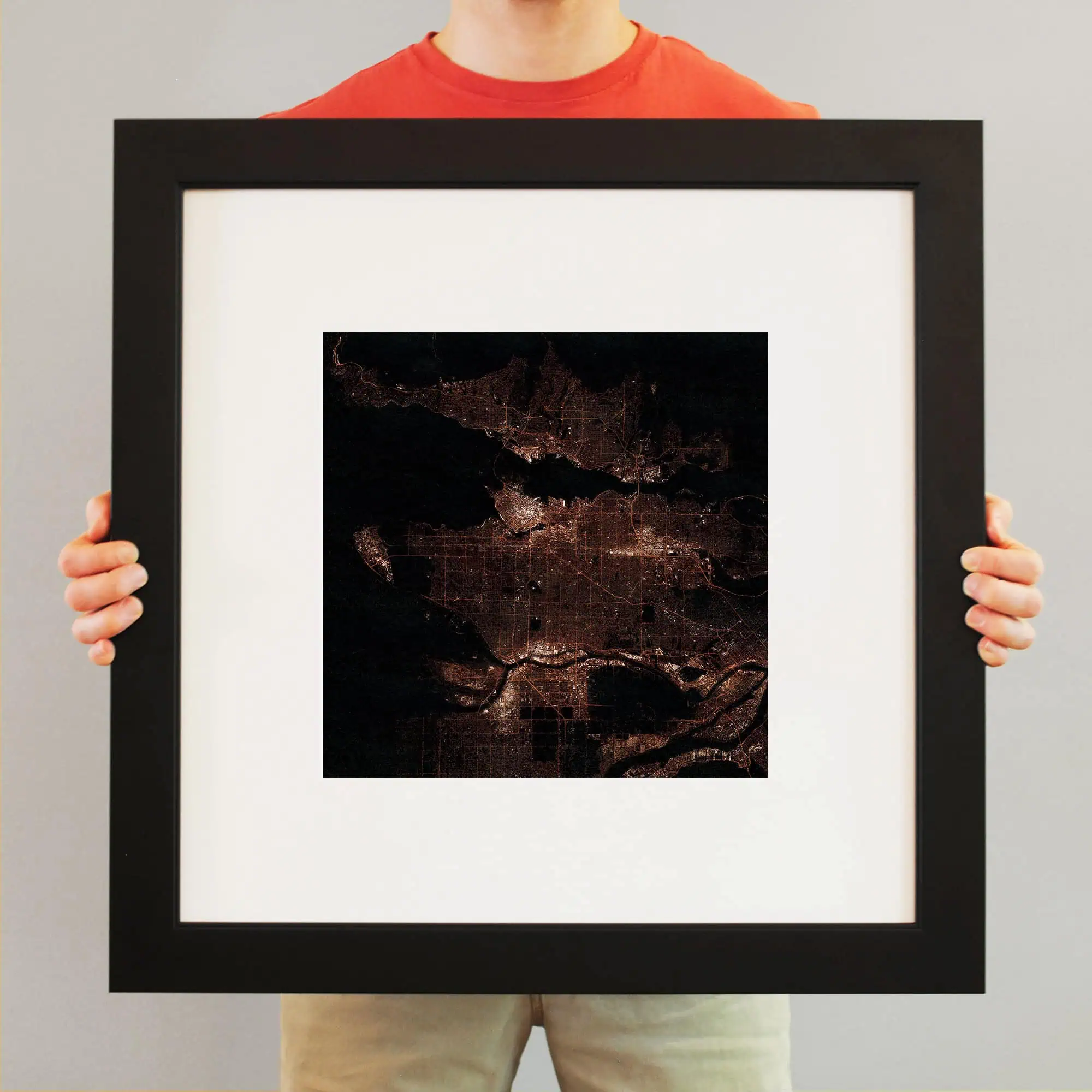 Detailed satellite map of a city at night, showcasing urban infrastructure, waterways, and road networks for geographic and cartographic reference. Perfect for mapping, navigation, and geographic study.