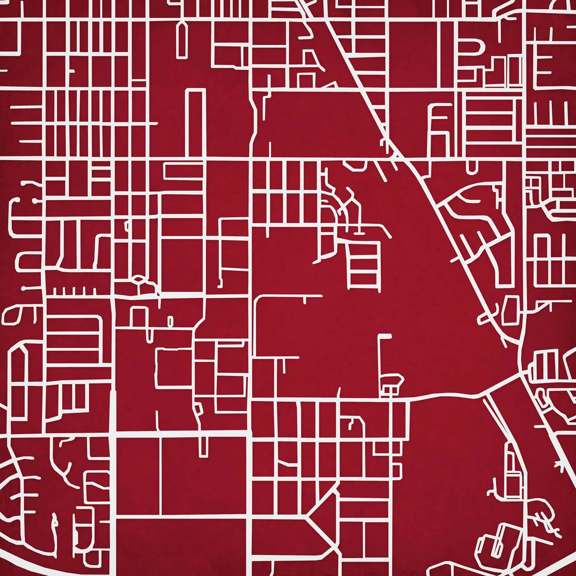 Map of city streets with a red background and white line details, showcasing detailed street layouts and urban planning for navigation and map shopping needs.