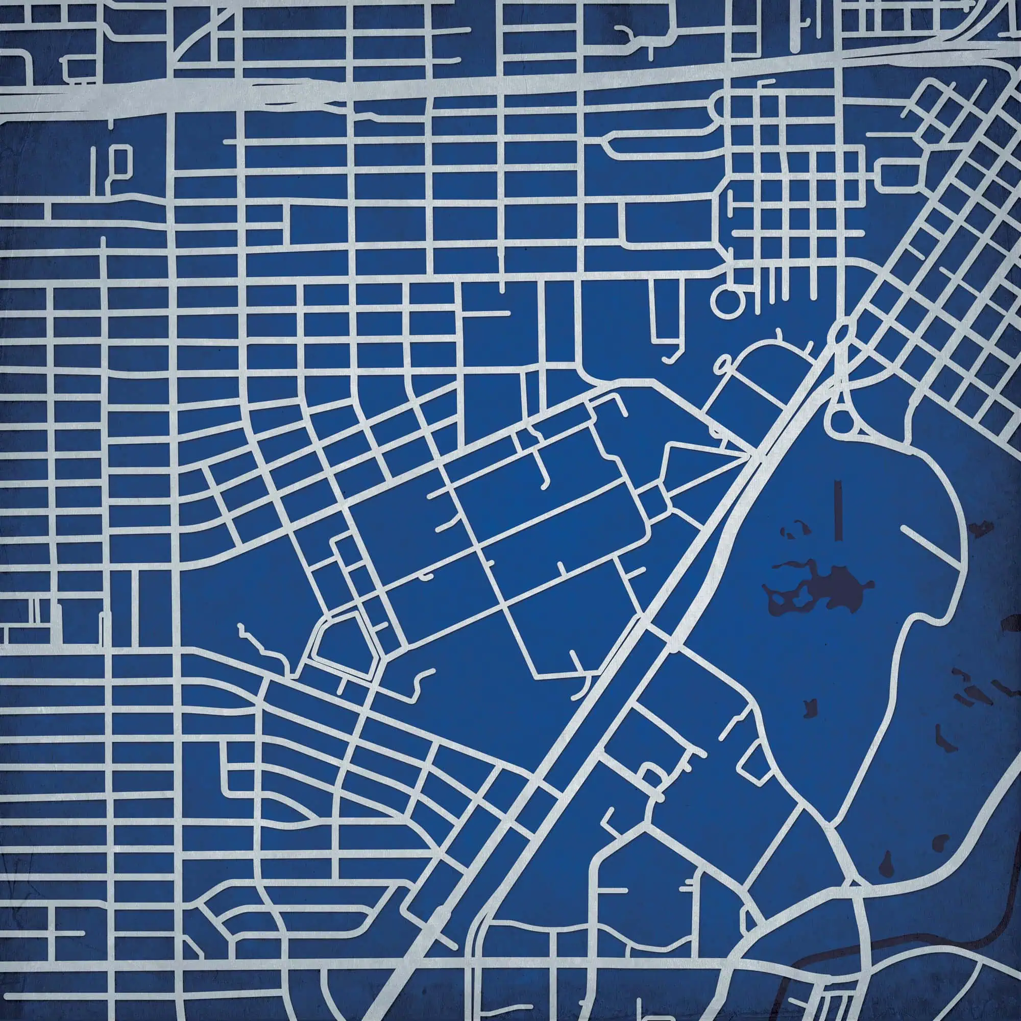Urban city map illustration with streets and waterways, highlighting detailed street grid and park areas, perfect for travel, navigation, and geographic reference.