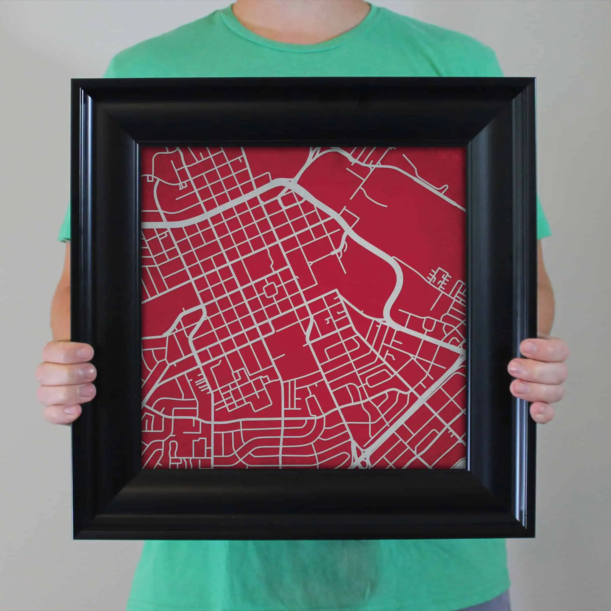 Detailed city map illustration with street layout on red background, perfect for navigation, travel planning, or geographic reference. Ideal image for maps, cartography, and geographic tools.
