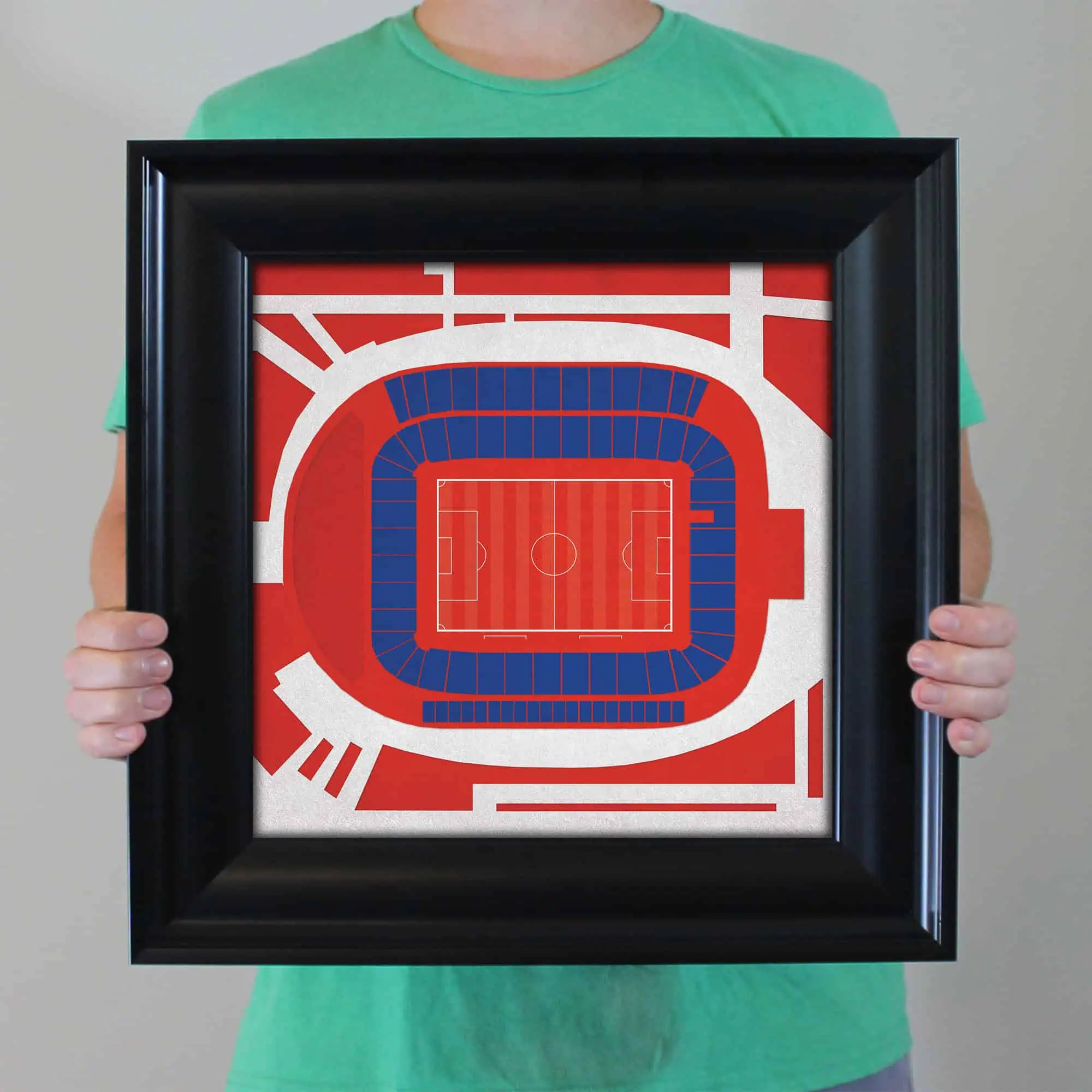 A framed illustration of a soccer stadium map, highlighting seating and field layout, ideal for sports venue planning, fan navigation, and stadium design insights.