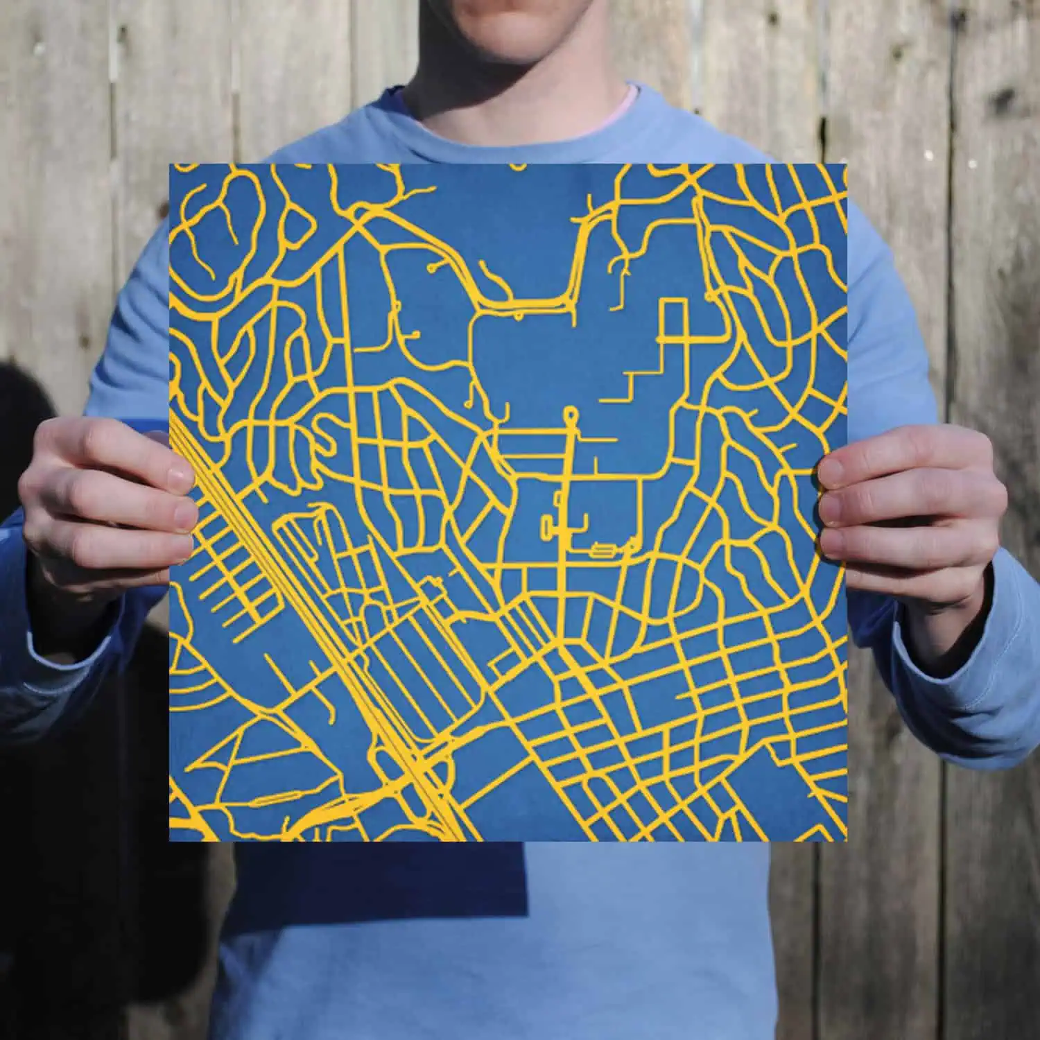 Colorful city street map in blue and yellow, perfect for urban navigation and outdoor adventures.