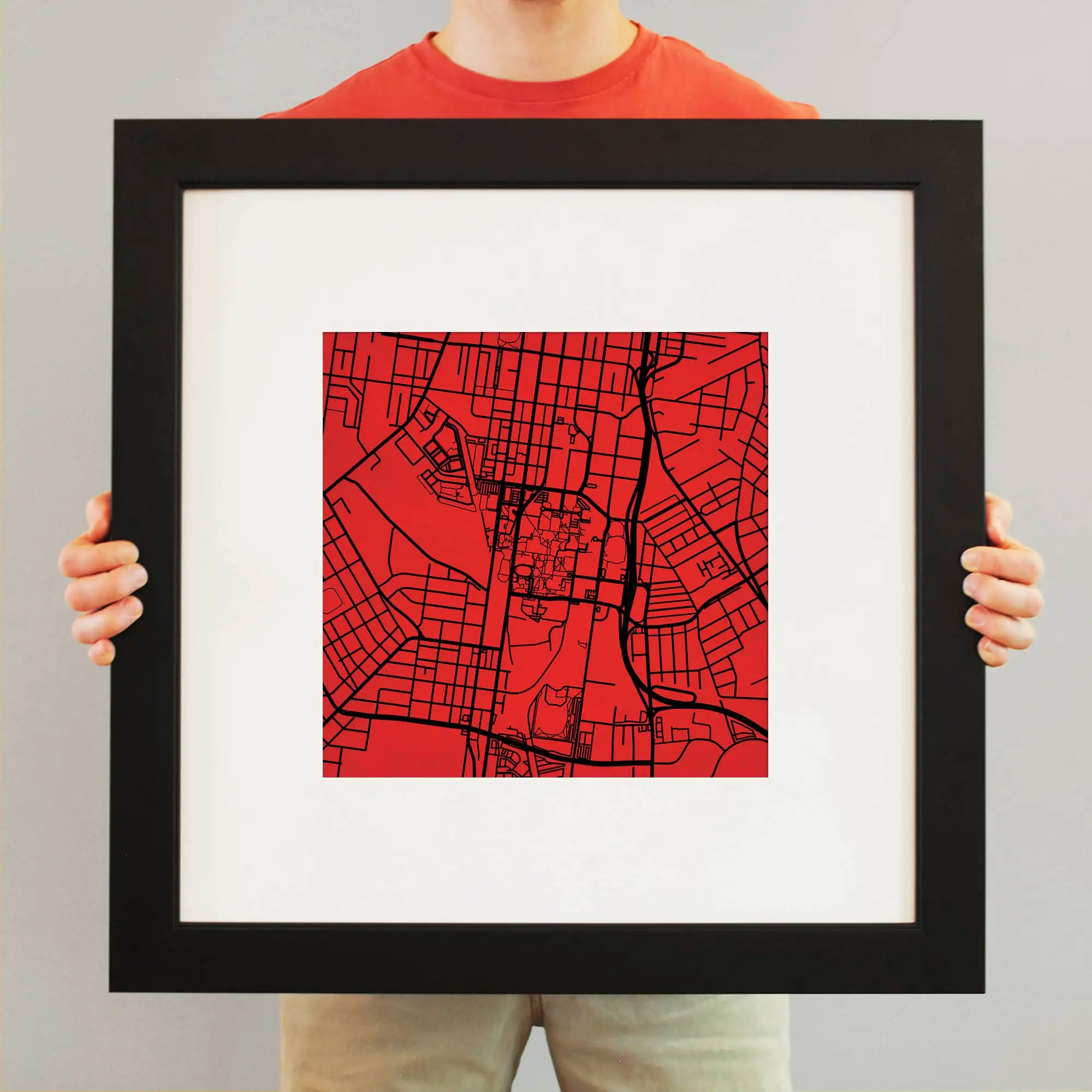 City street map art print, framed artwork featuring a modern red and black city map, perfect for home decor, office, or map enthusiasts. High-quality print showcasing urban layouts and transportation routes.