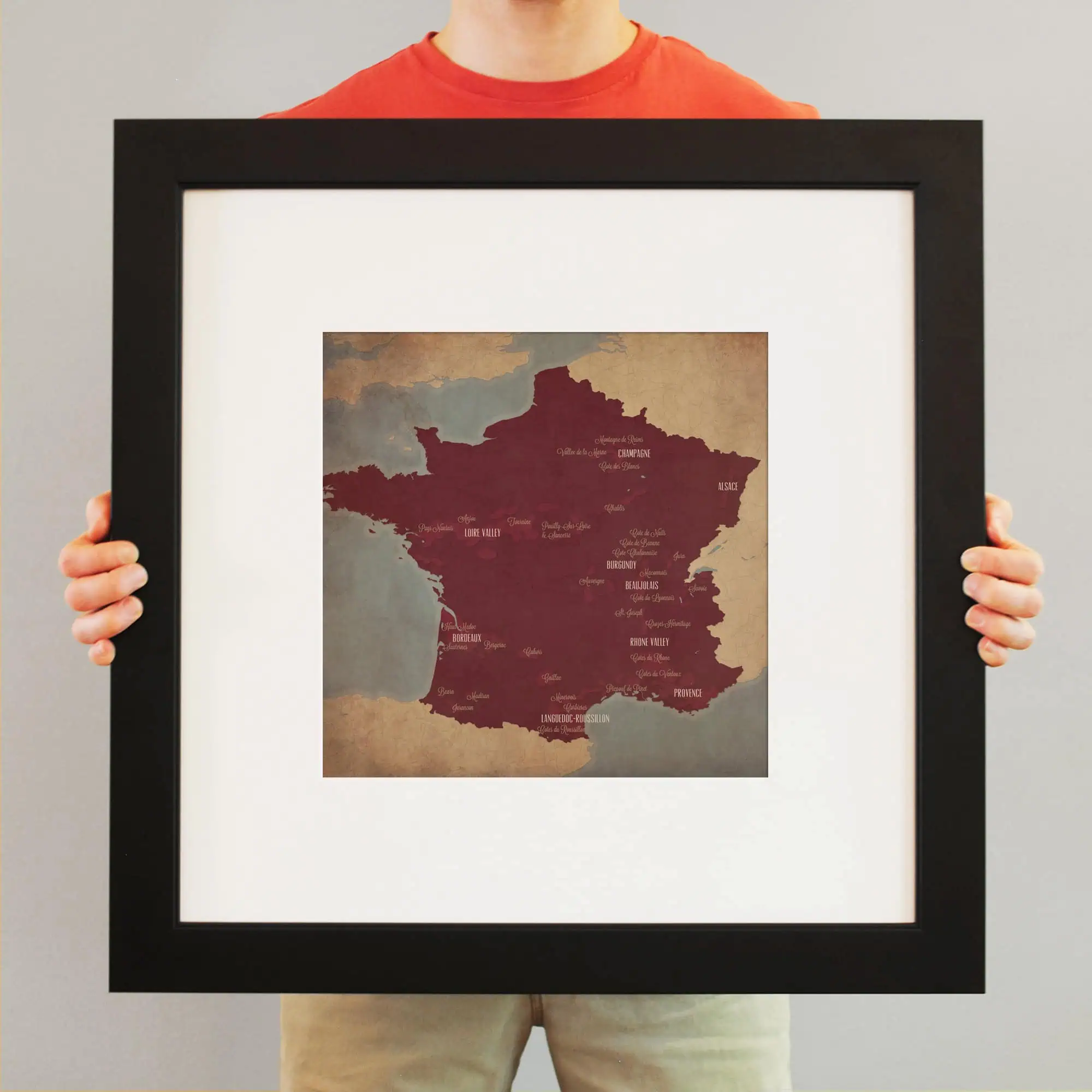 Colorful map of France with wine regions, framed for wall display, perfect for wine enthusiasts and map collectors, showcasing detailed regional labels and vintage style.
