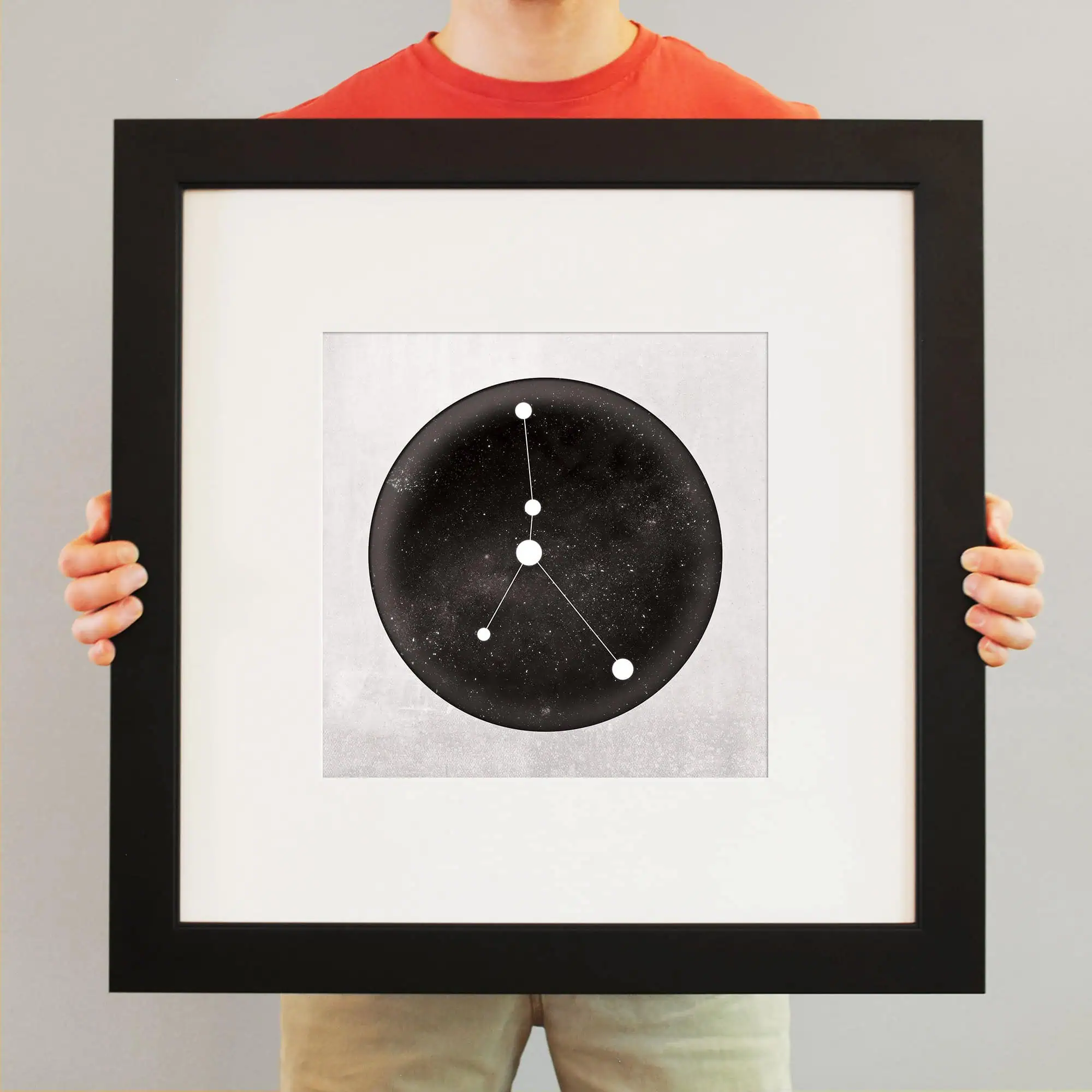 Astrological star chart artwork featuring constellations, celestial icons, and cosmic design, framed and displayed for astronomy and zodiac enthusiasts, available at The Map Shop.