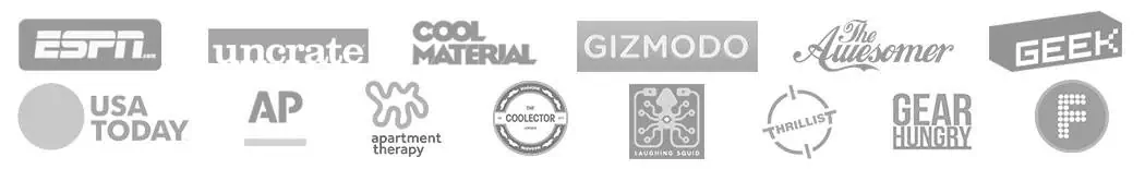 An image of multiple logos from popular brands including ESPN, Gizmodo, Geek, and USA Today, showcasing The Map Shop's extensive collection of iconic brand logos and merchandise.